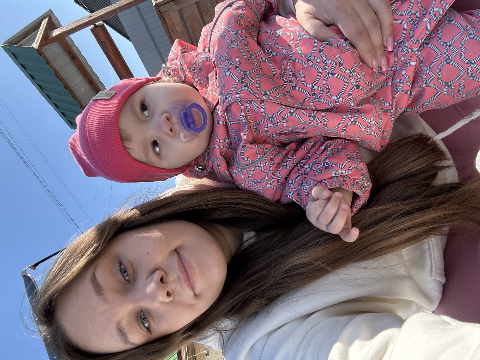 Family enjoys sunny winter day in Russian village