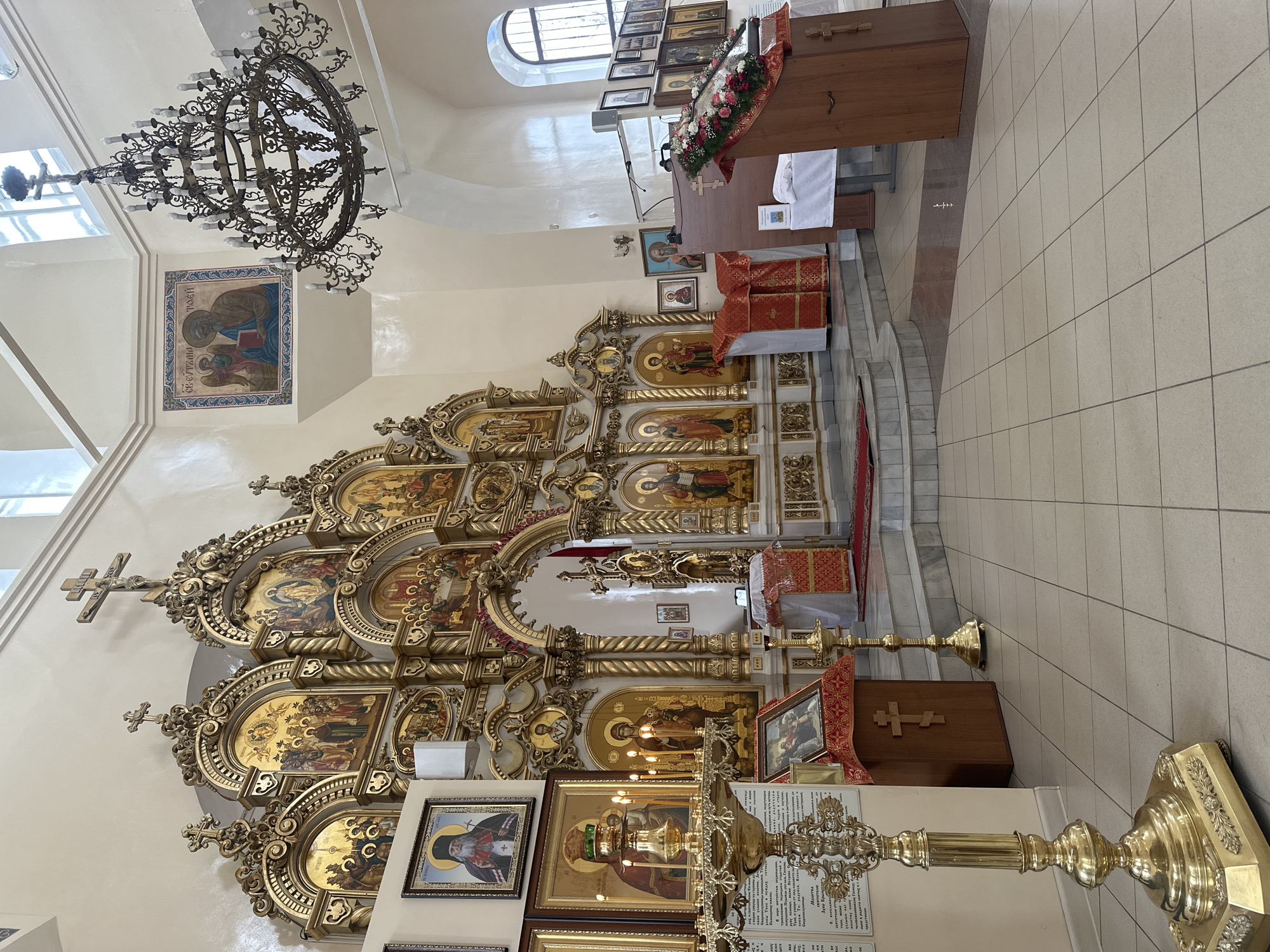 Orthodox church interior with ornate iconostasis documented in Votkinsk