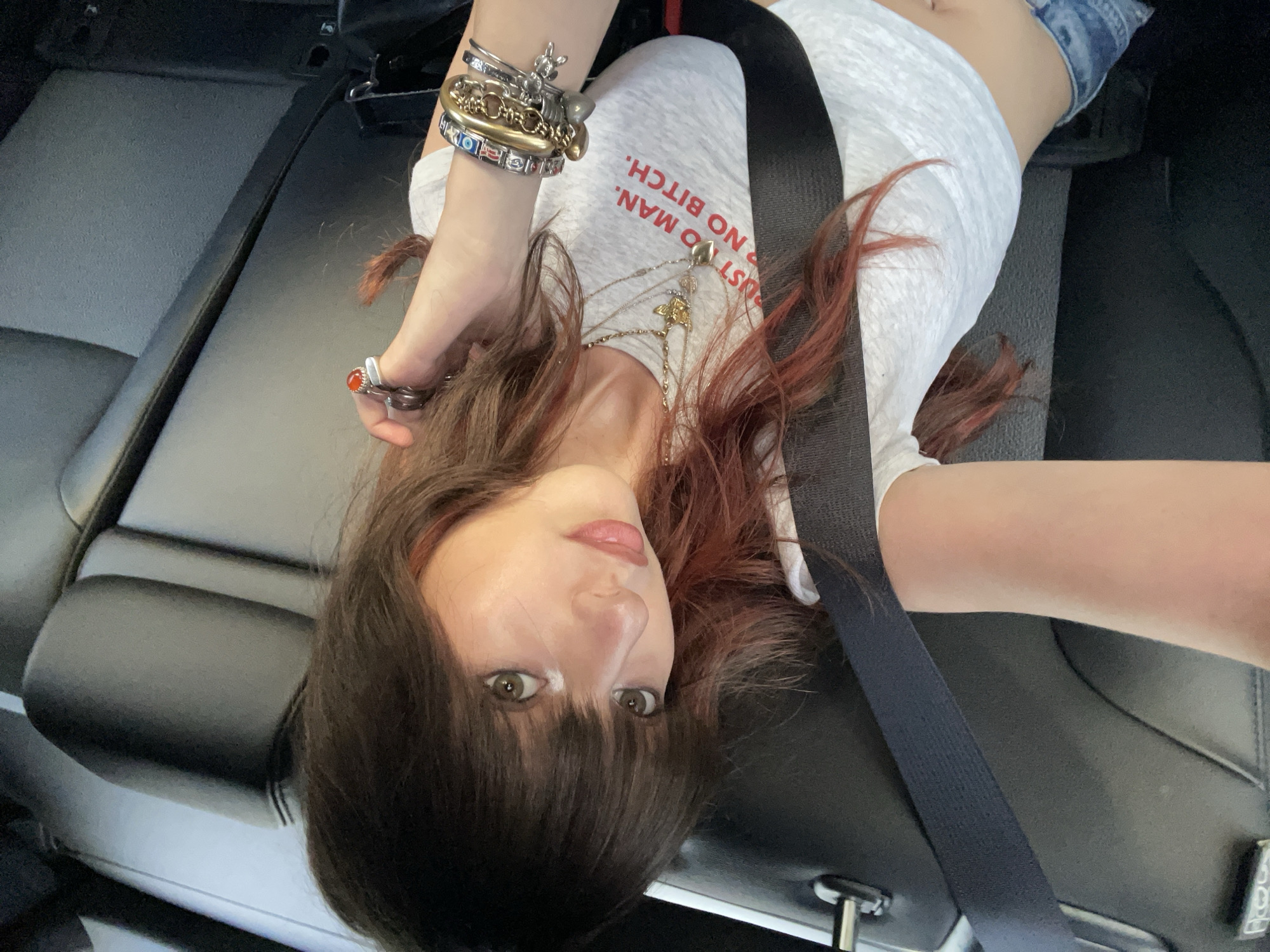Woman rests in car seat in Raanana, Israel