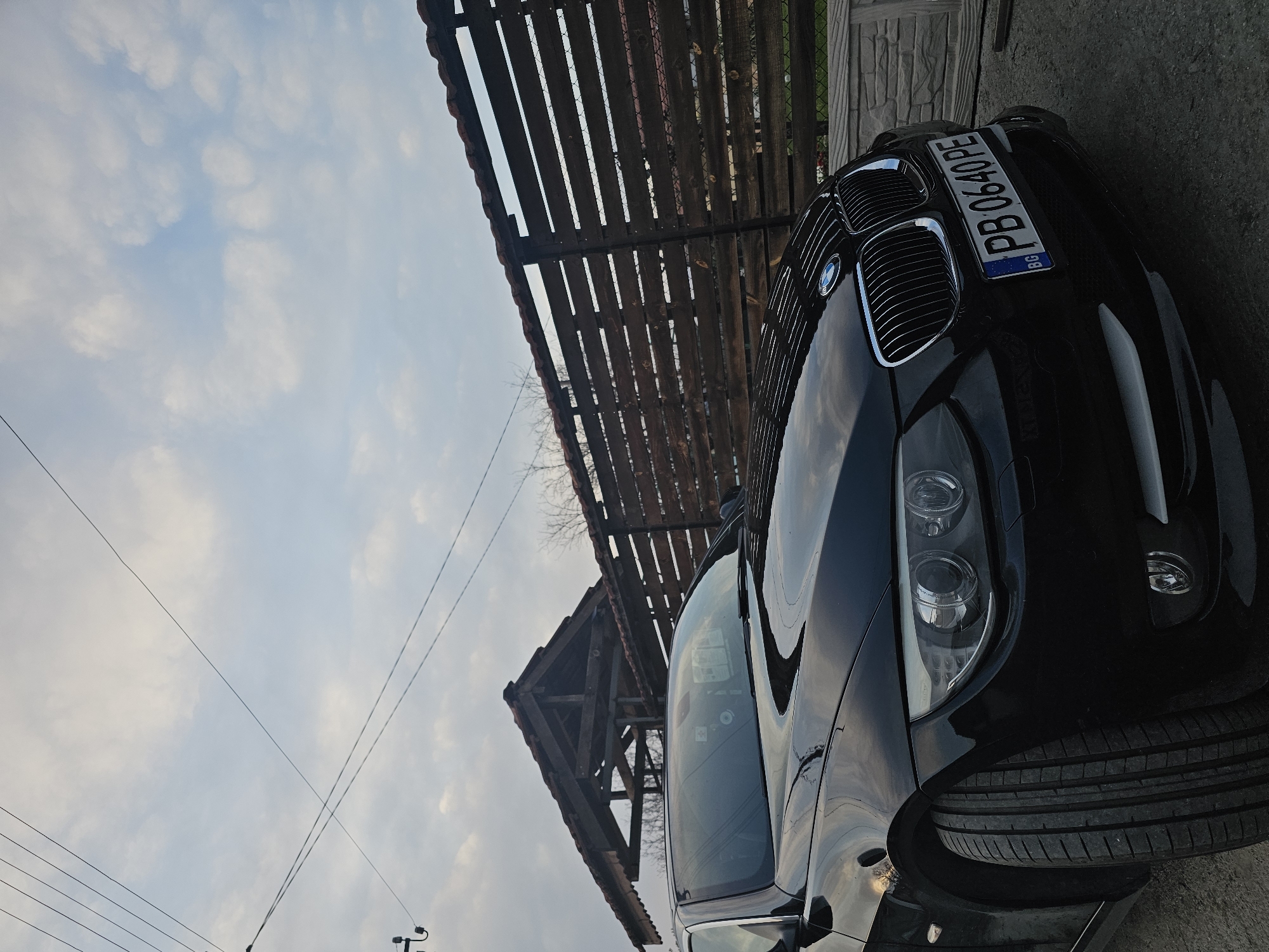 Black BMW parked on dirt road in Krasnovo, Bulgaria