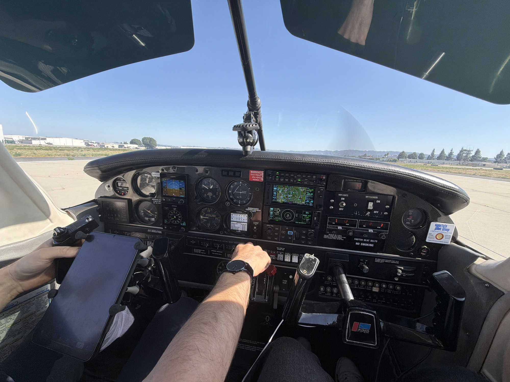 Pilot operates Piper aircraft on Los Angeles airport ground