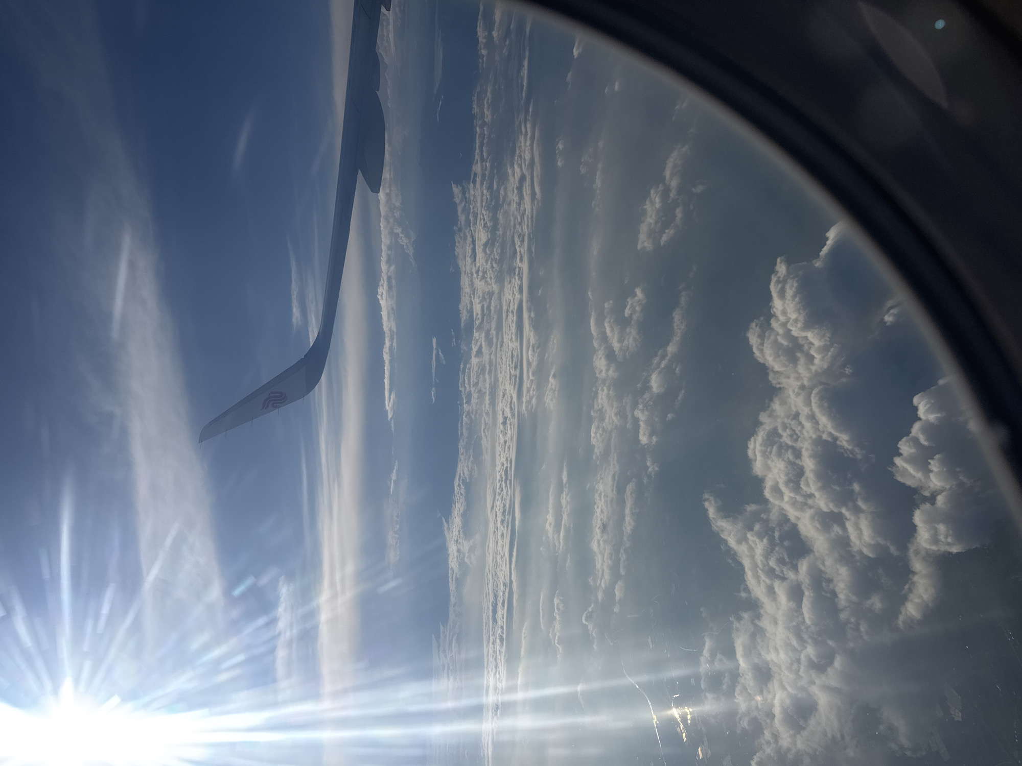 Air China passenger documents flight experience over Tashkent region