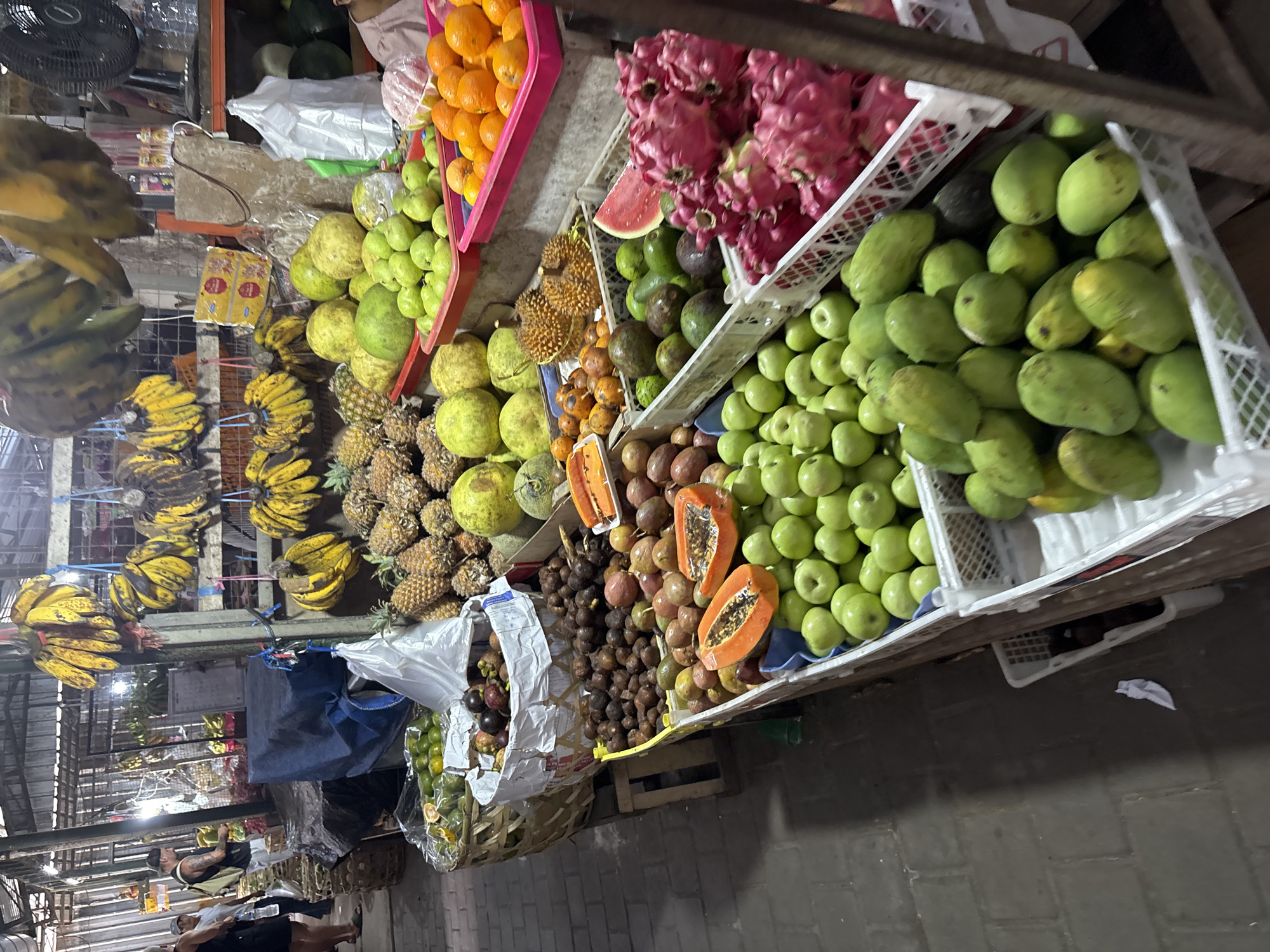 Fruit vendor displays tropical produce in Ungasan, Indonesia
