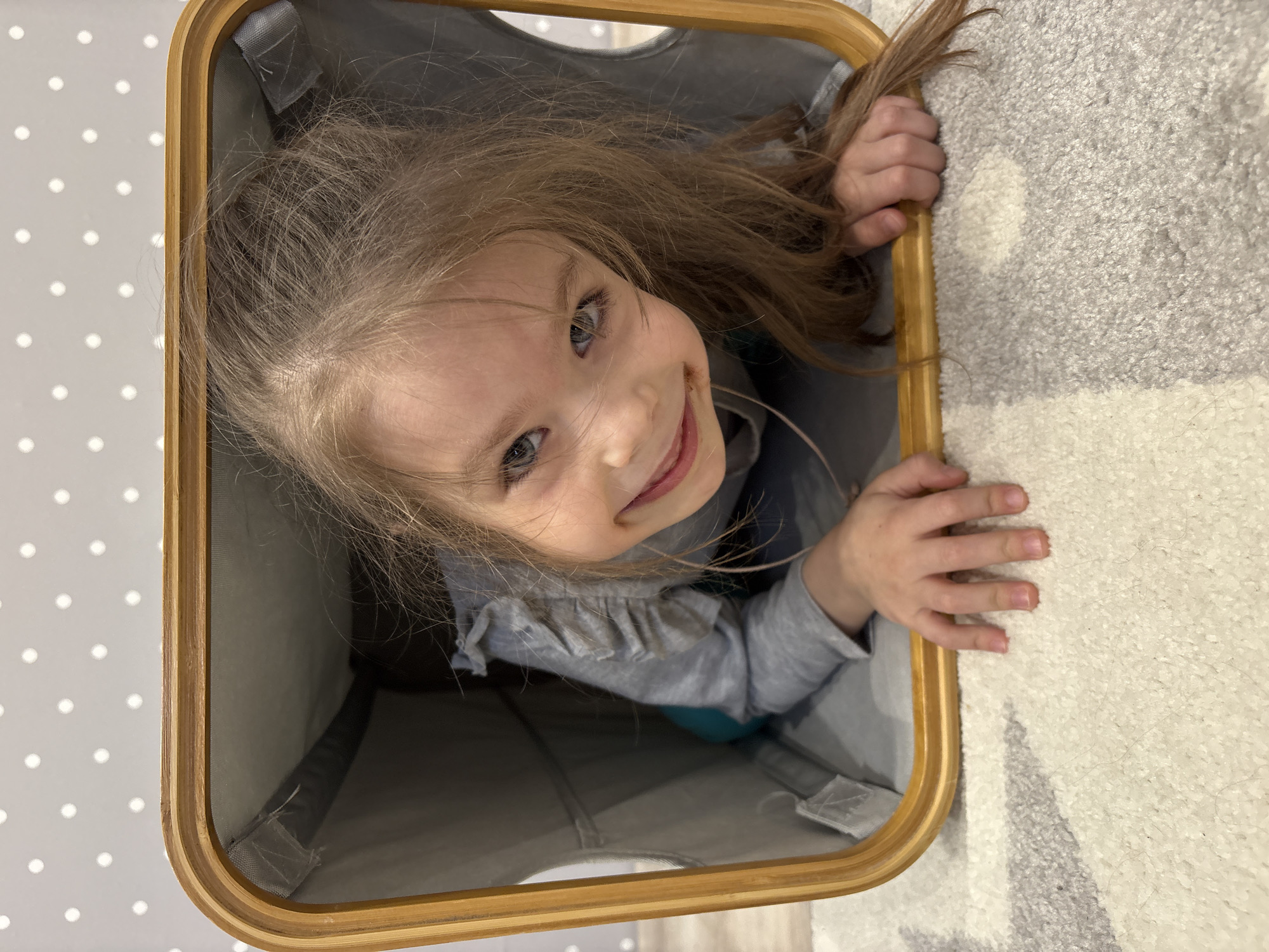 Child plays peek-a-boo from container in Votkinsk, Russia