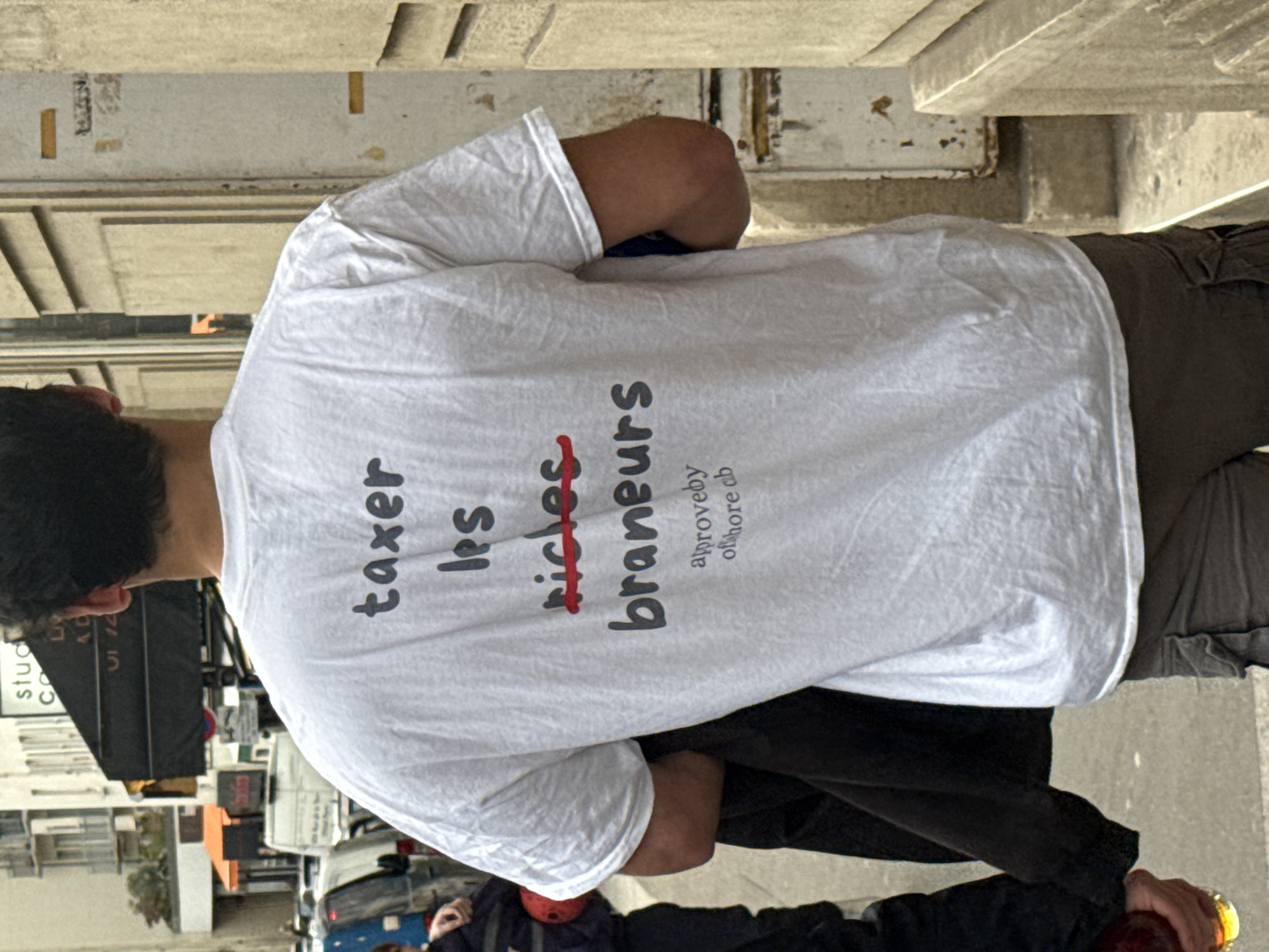 Man spotted wearing anti-tax protest shirt in Paris