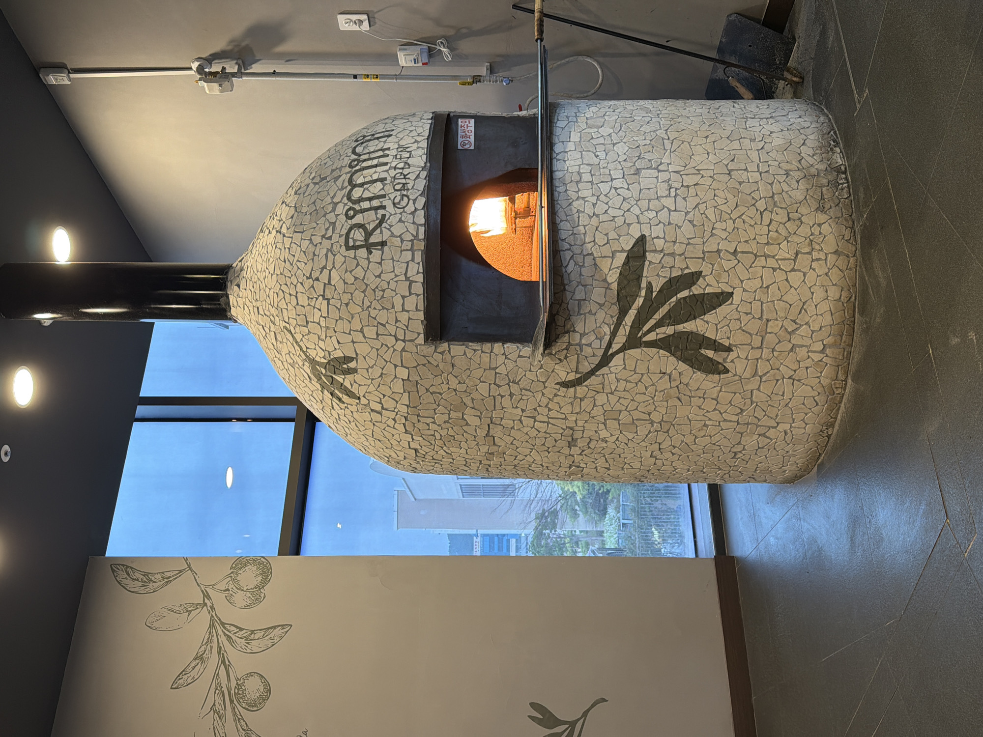 Wood-fired pizza oven spotted at Rimini Garden restaurant