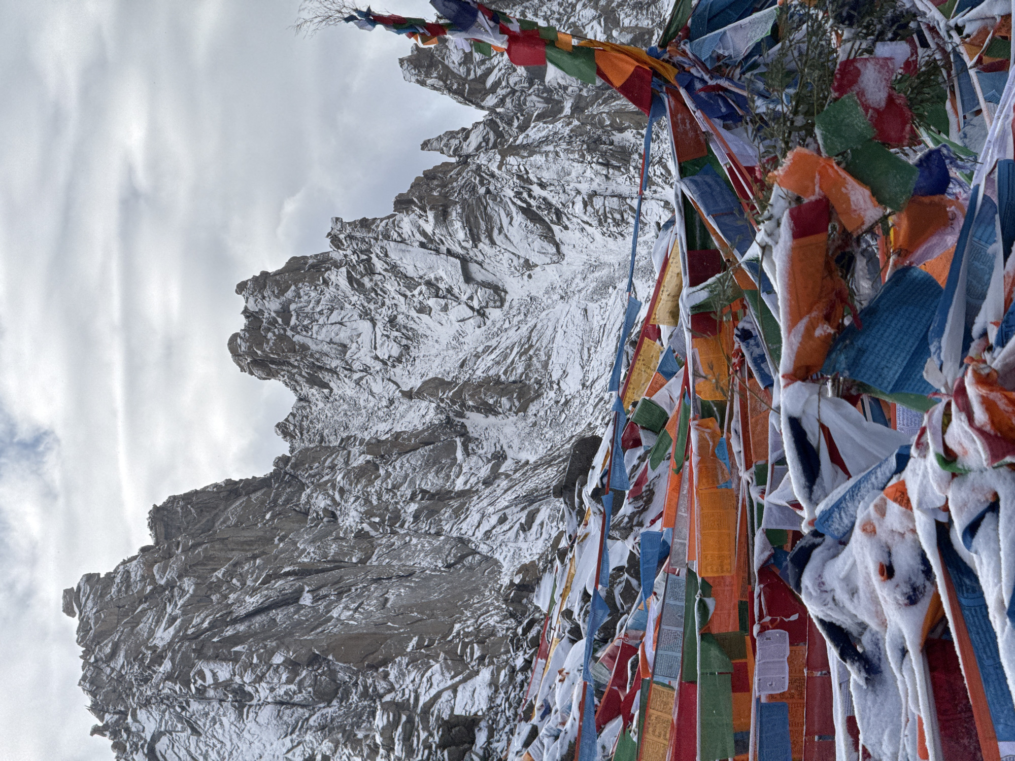 Buddhist prayer flags displayed on mountain landscape in China