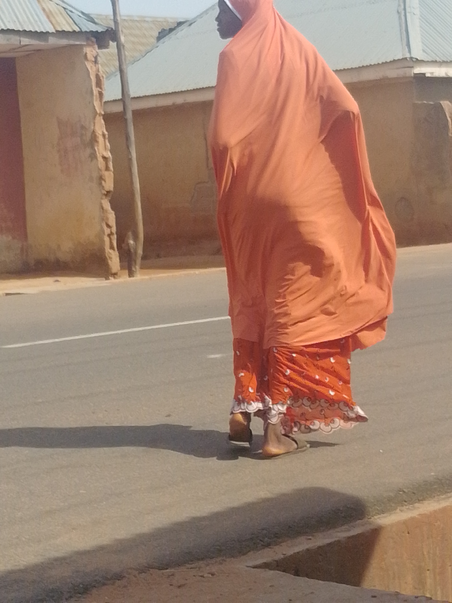 Morning street life on a busy road in Tempure, Nigeria