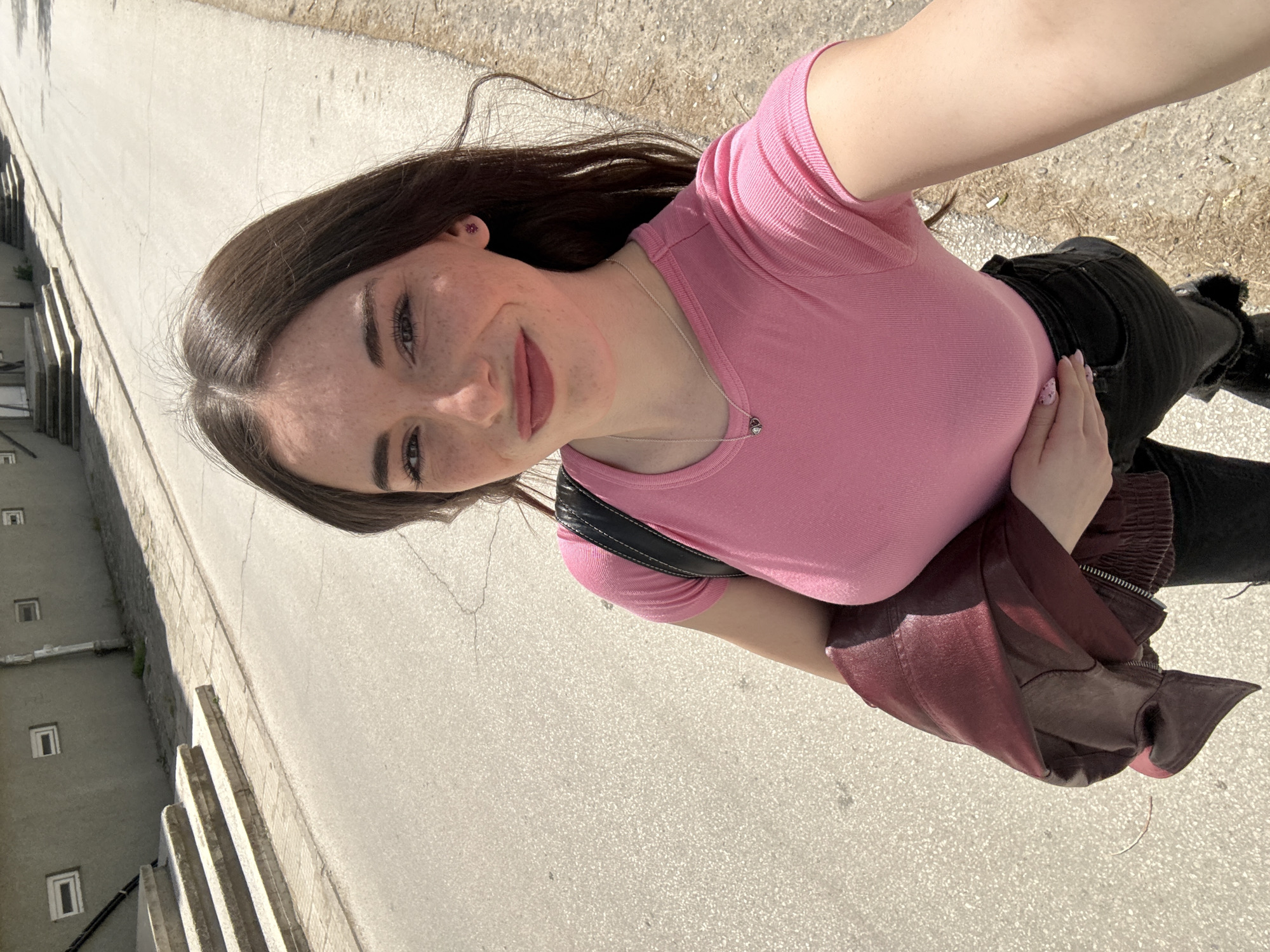 Woman takes sunny selfie in Plovdiv, shows manicured nails