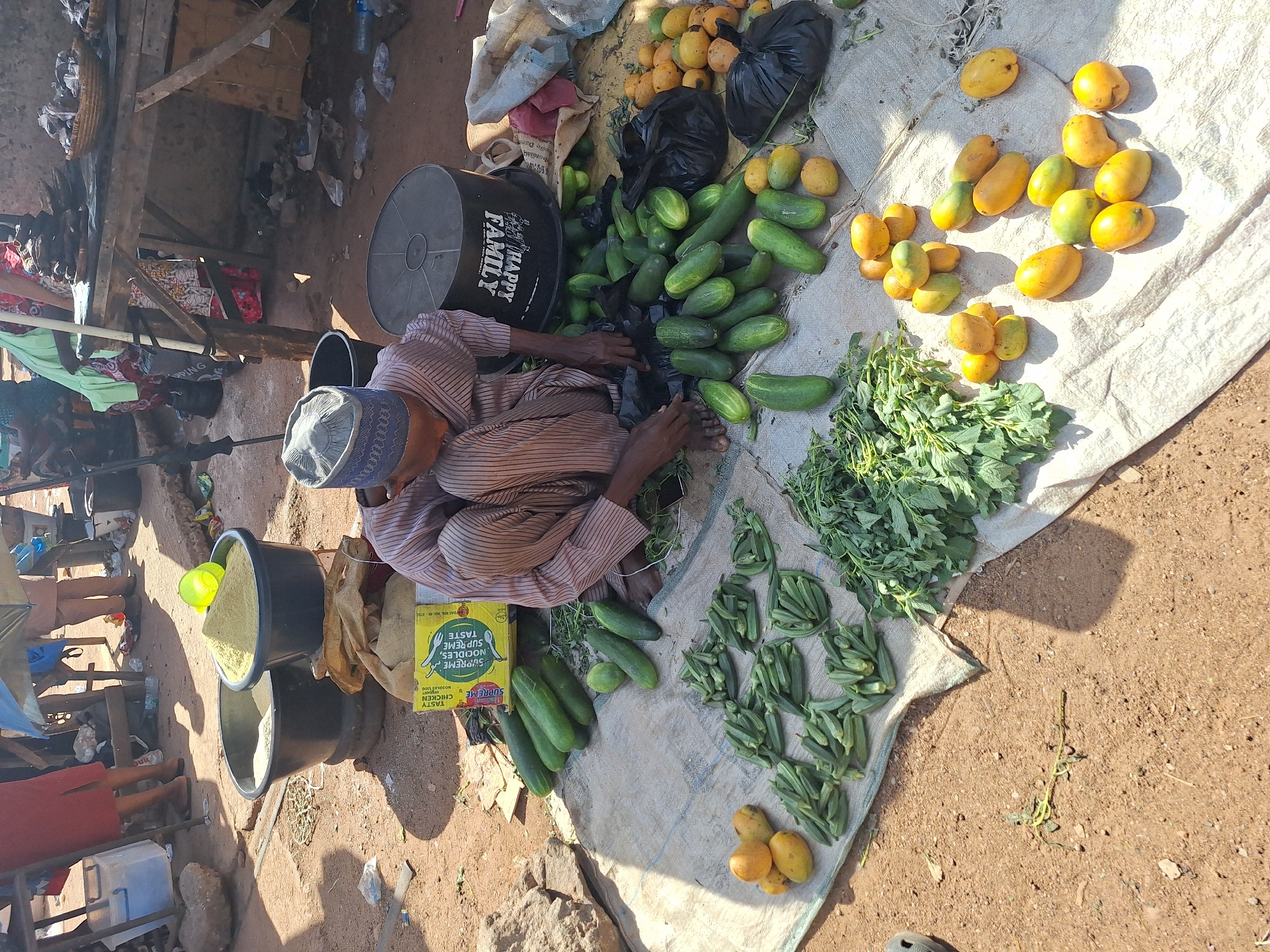 Vendors sell dried goods at Kakuri Gwari market
