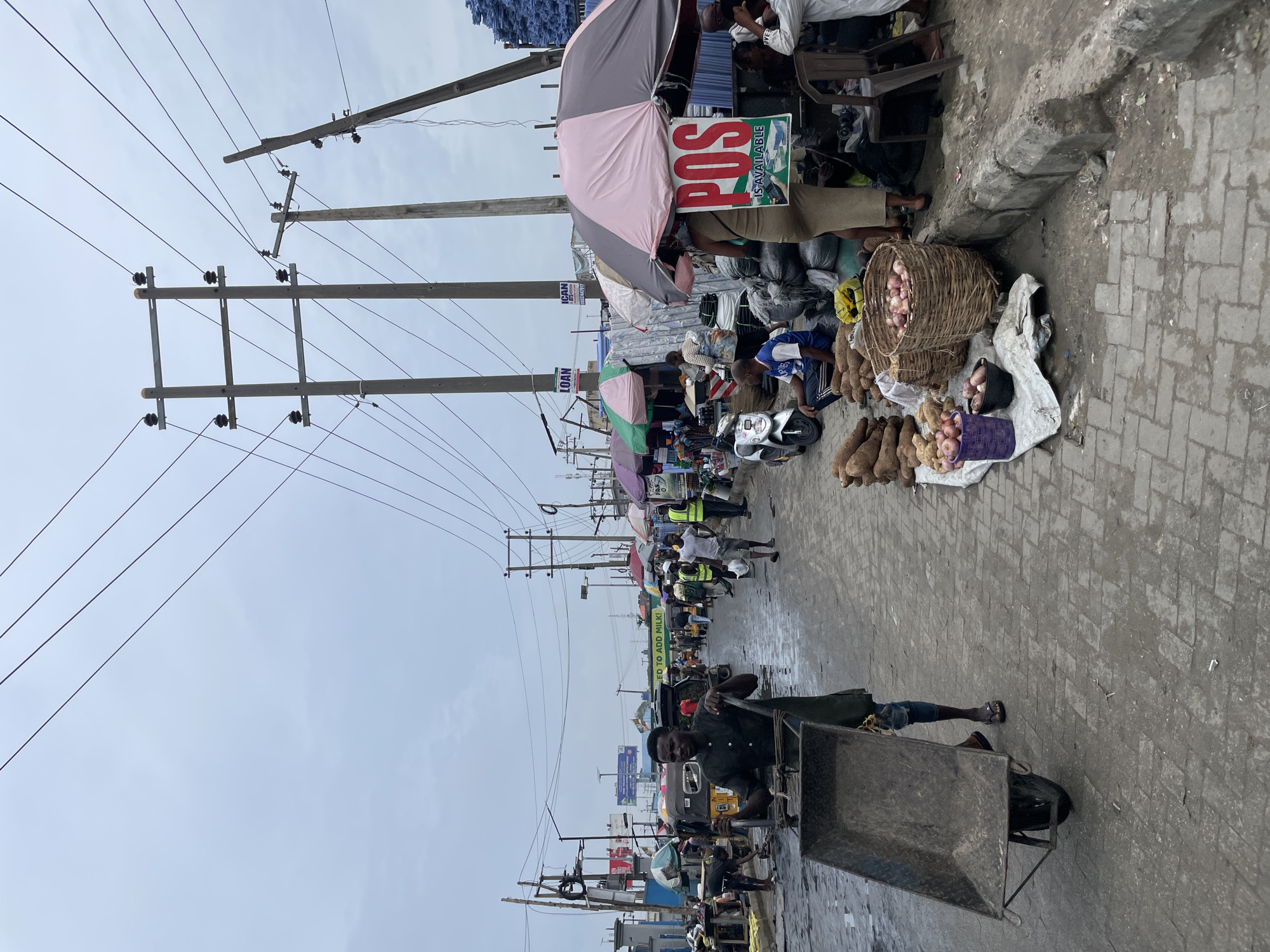 Lagos street markets buzzing with vendors, shoppers during morning hours