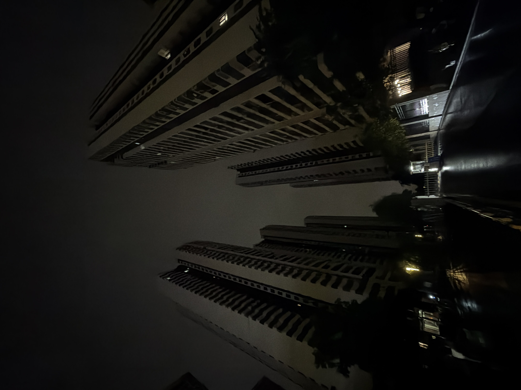 Rainy night in Chongqing's High-tech Zone, streets wet and quiet
