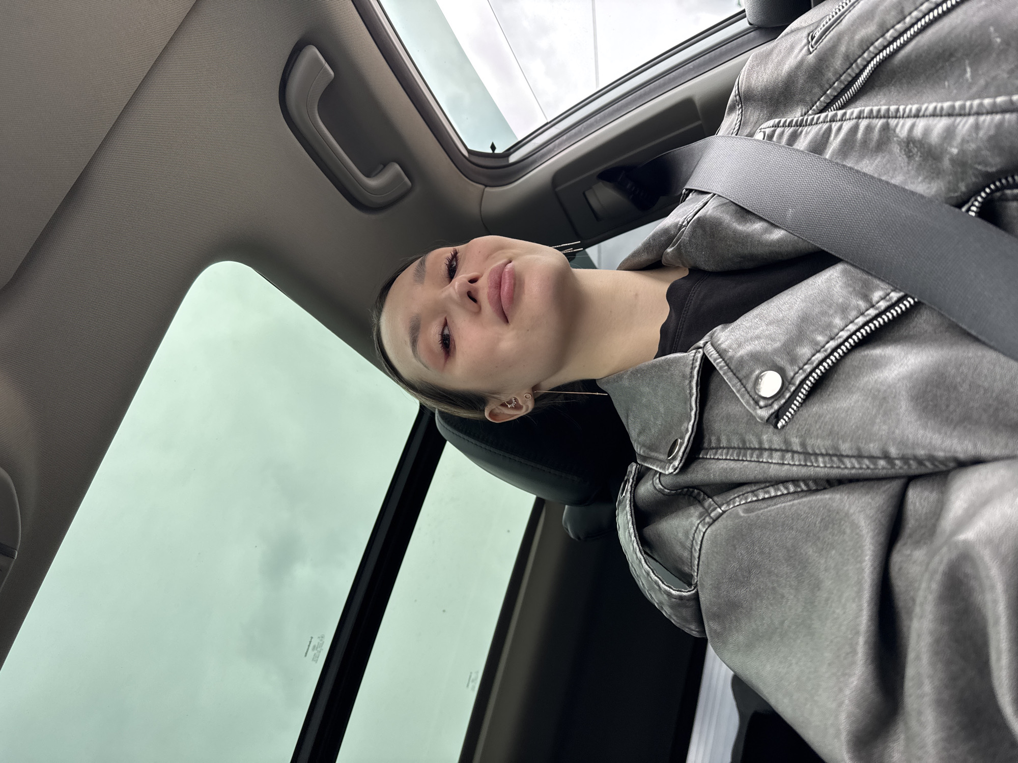 Woman photographed in extended car photo session