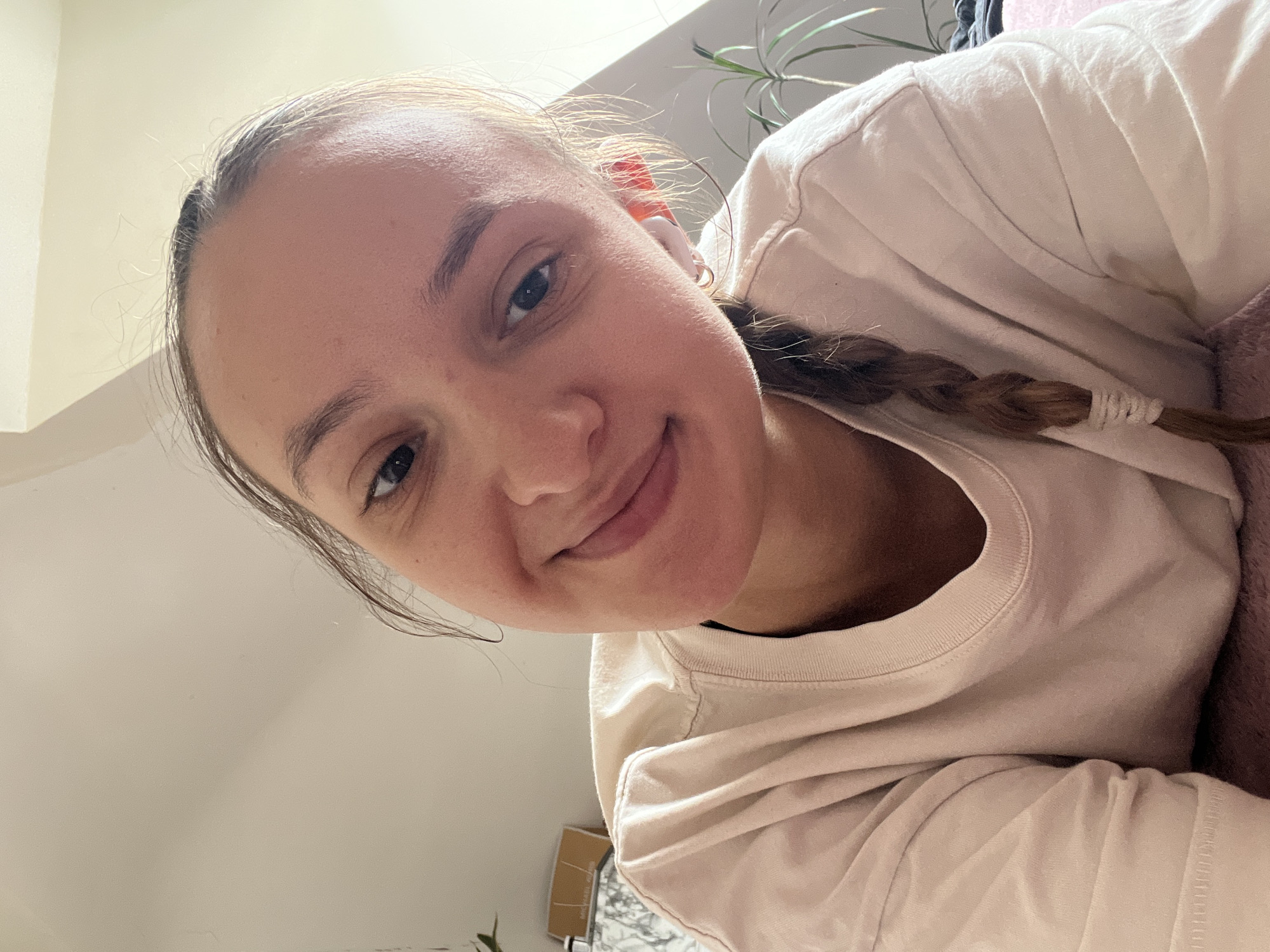 Portrait of braided woman photographed indoors in Saarbrücken