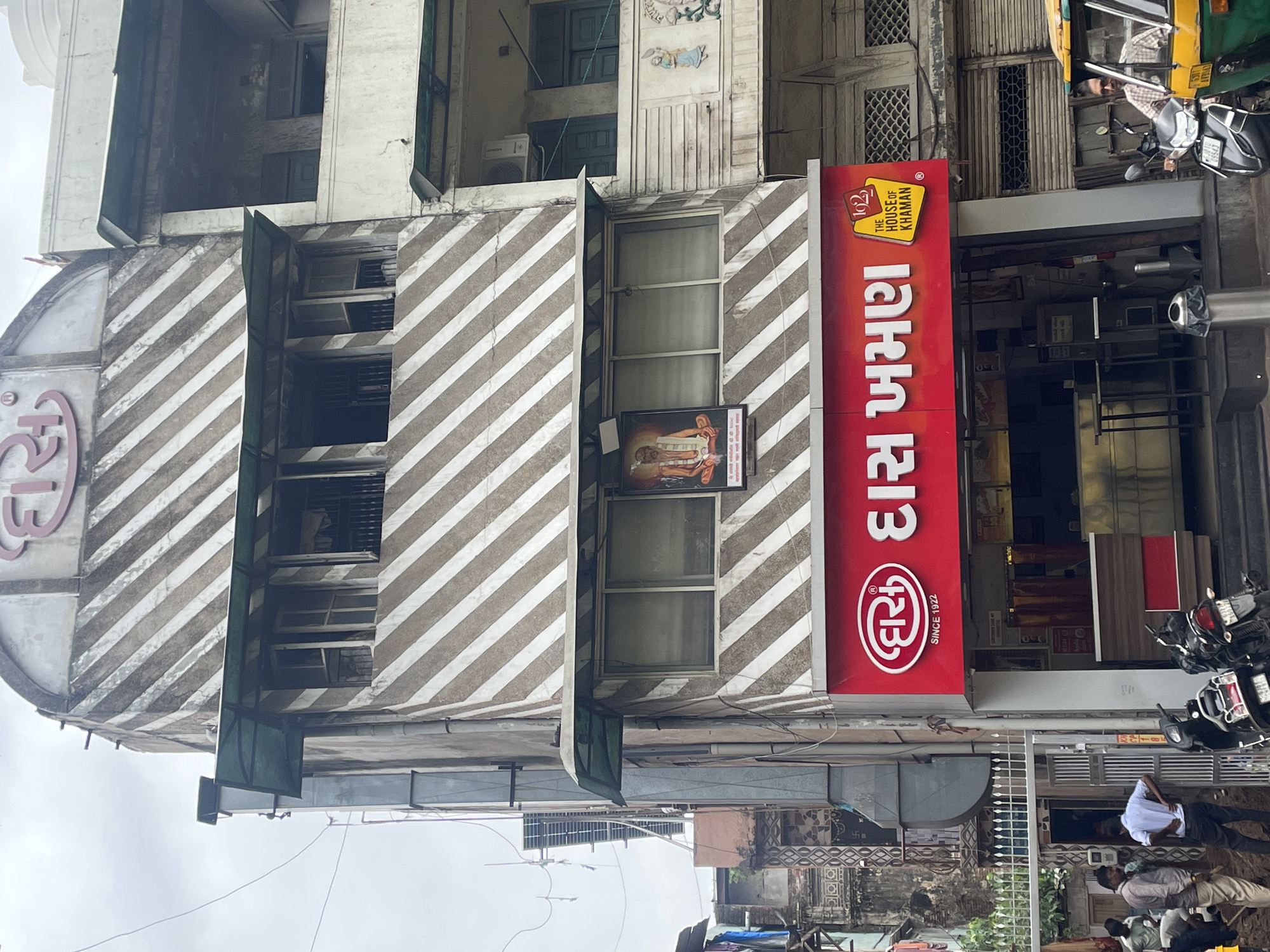 Das Khaman's century-old facade and a nearby Ahmedabad building
