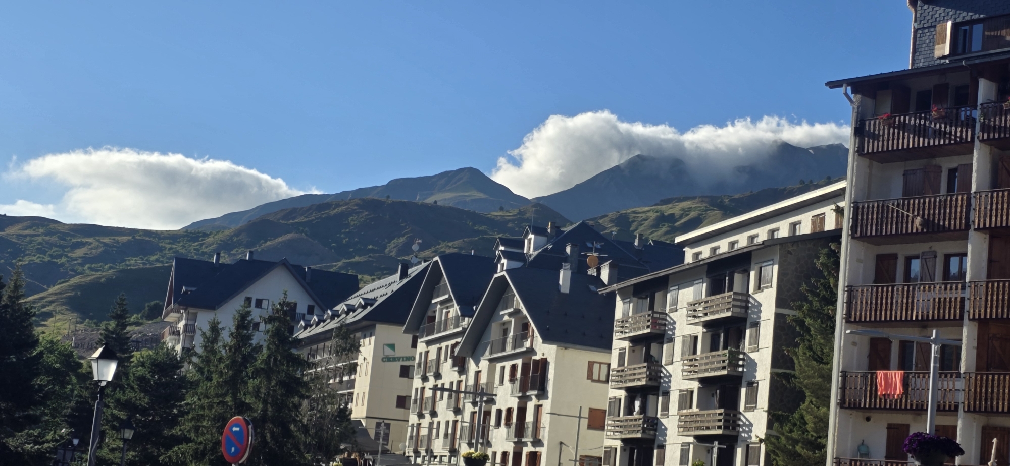 Pyrenean village street life meets busy restaurant kitchen prep