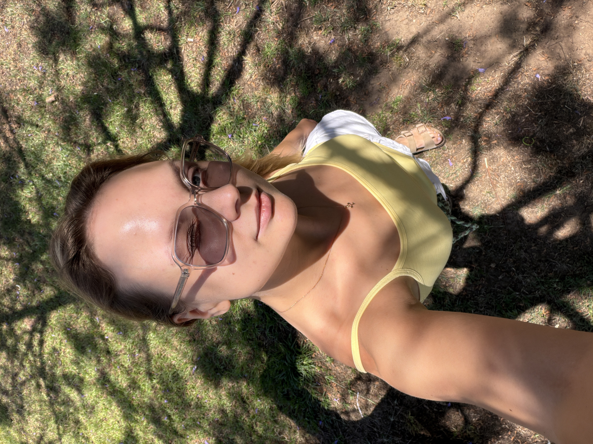 Sunny Tel Aviv selfie session, yellow top, wooden bench