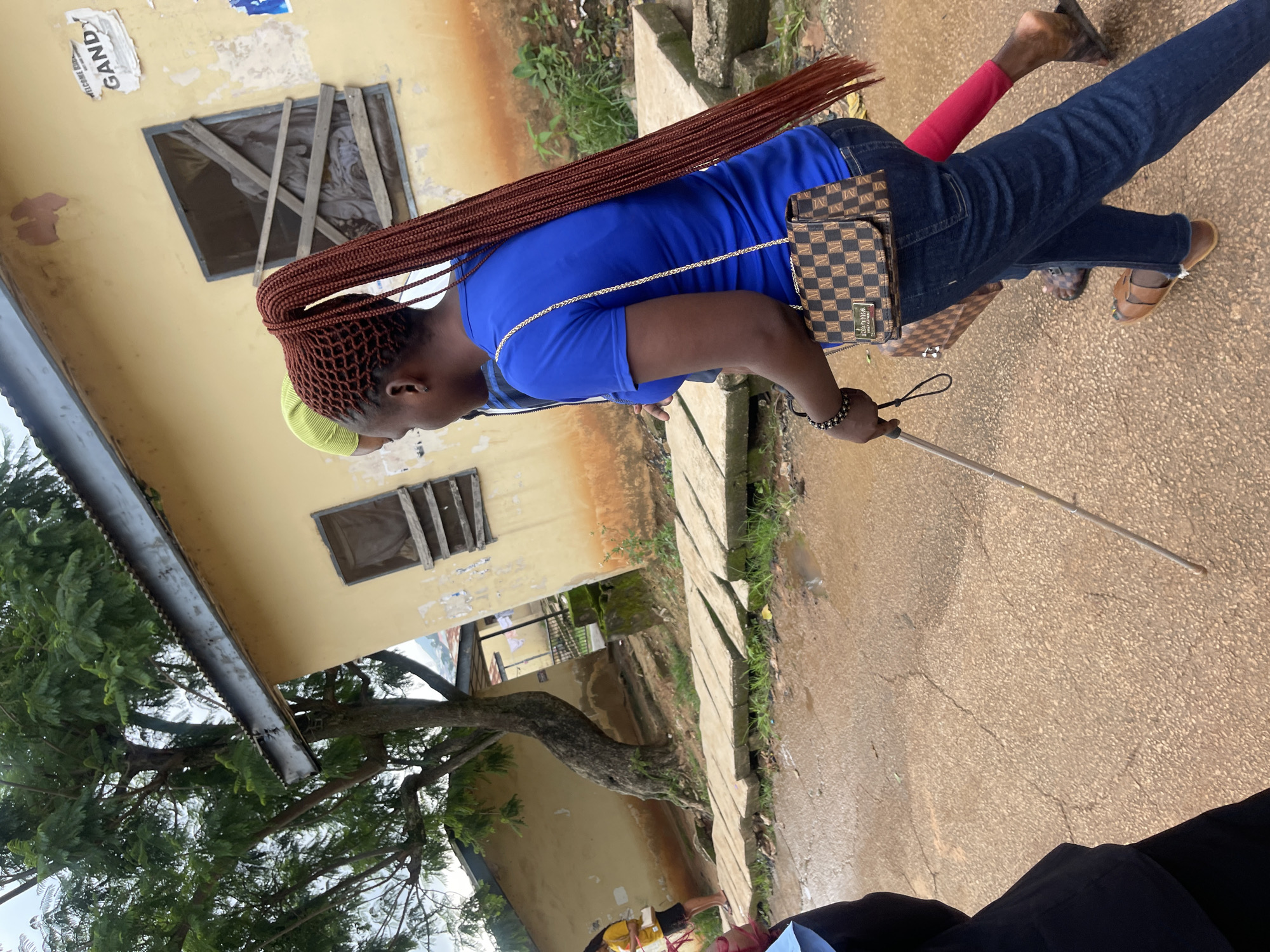Morning foot traffic along a street in Rafin Par, Nigeria