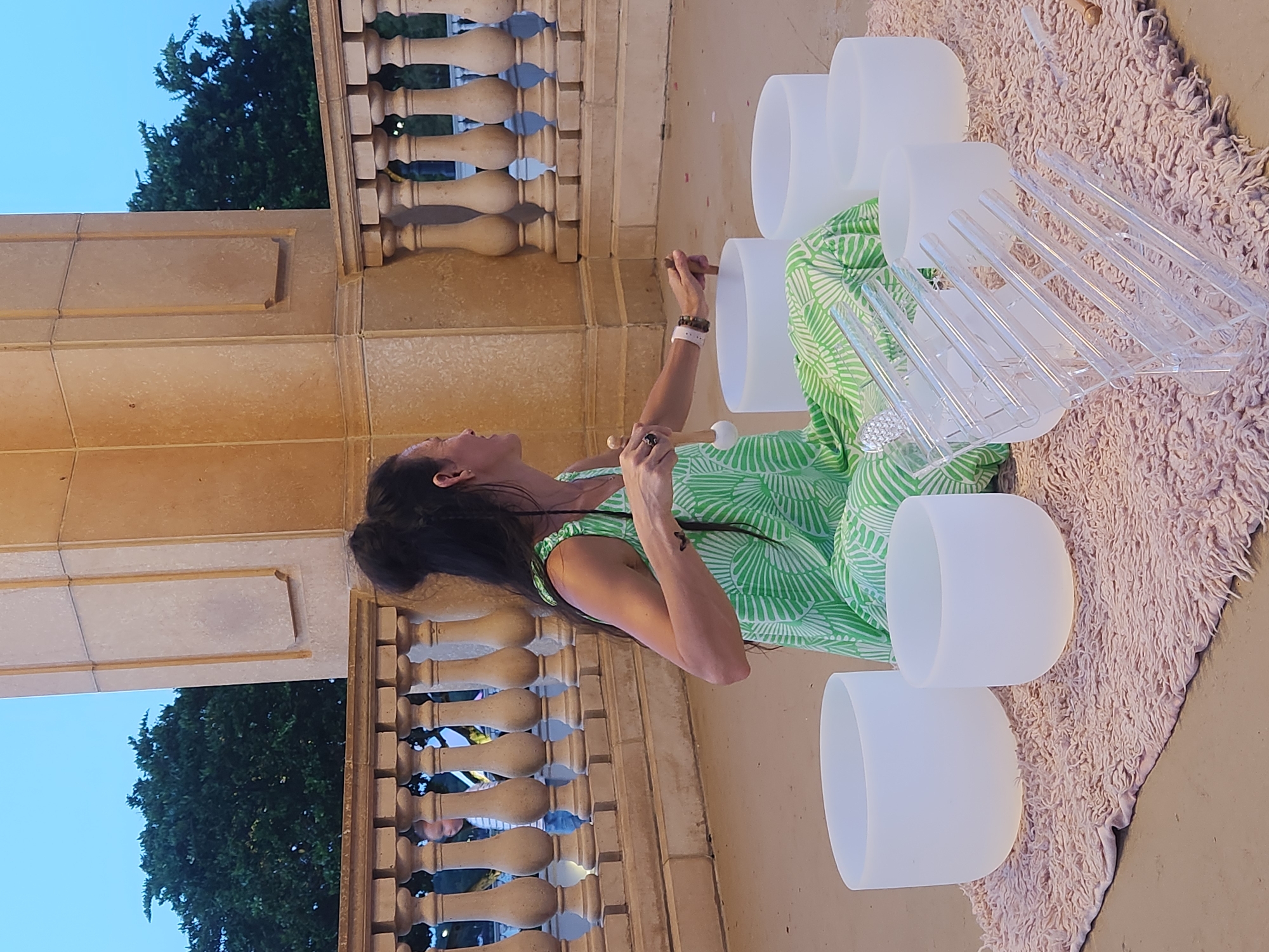 Crystal singing bowl session at dusk on Altamonte Springs waterfront