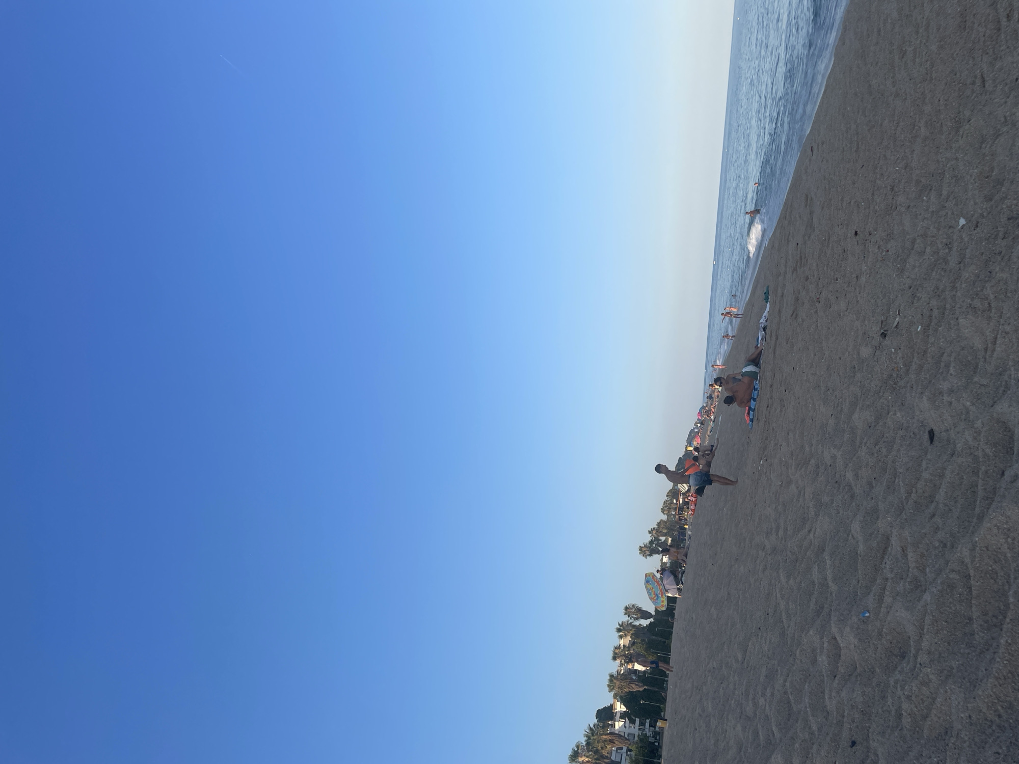 Saturday beach evening in Canet de Mar — swimming, fishing, sunset