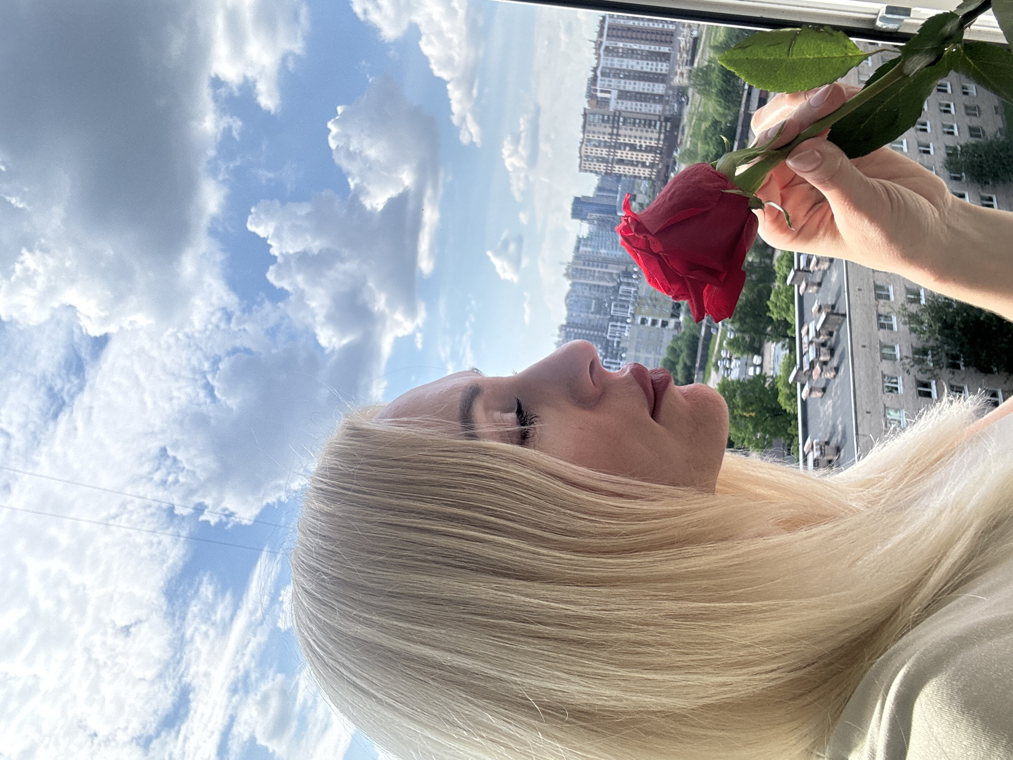 Woman photographed with red rose in multiple poses