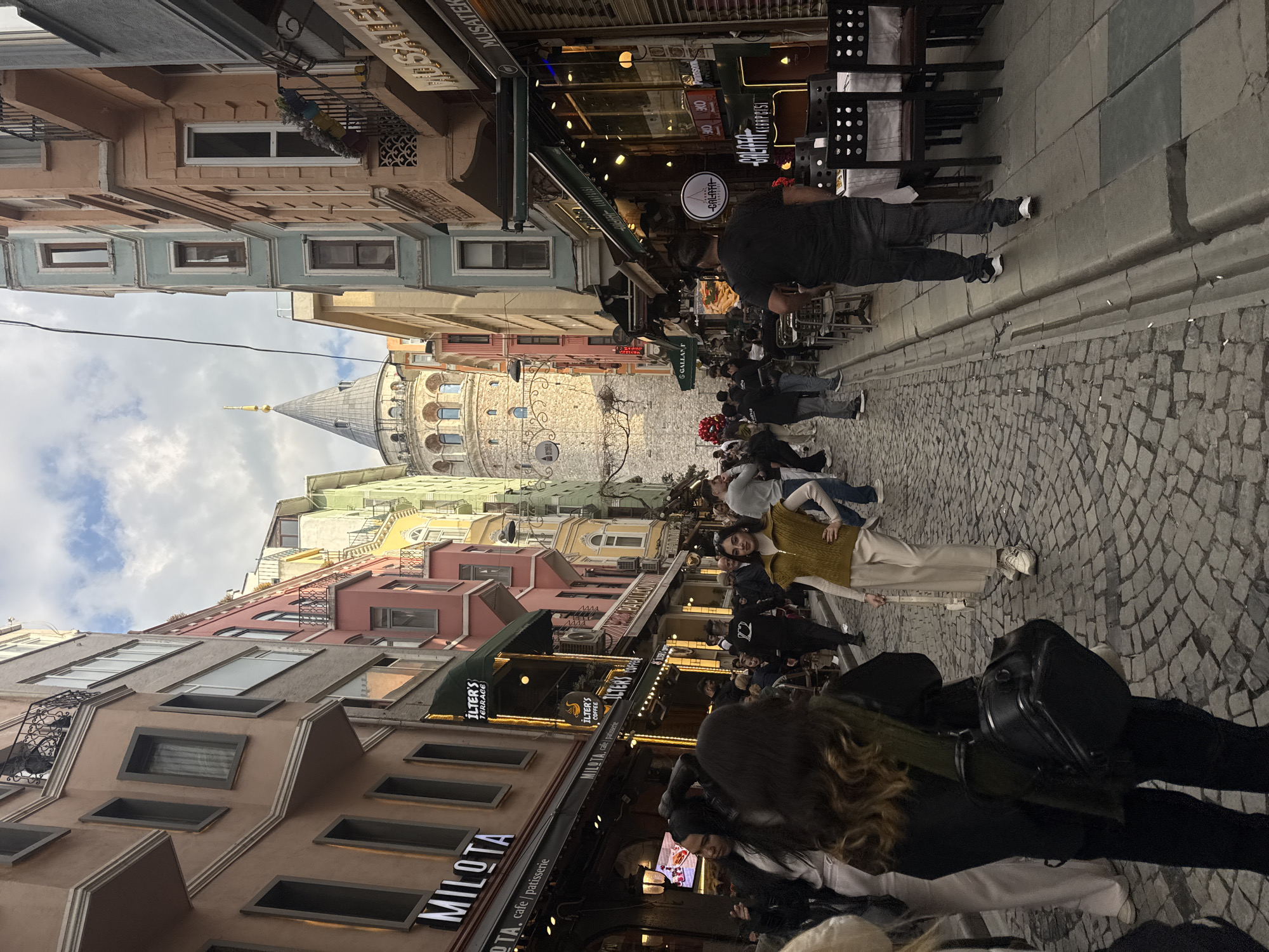 Street scene captured in Beyoğlu with Galata Tower visible