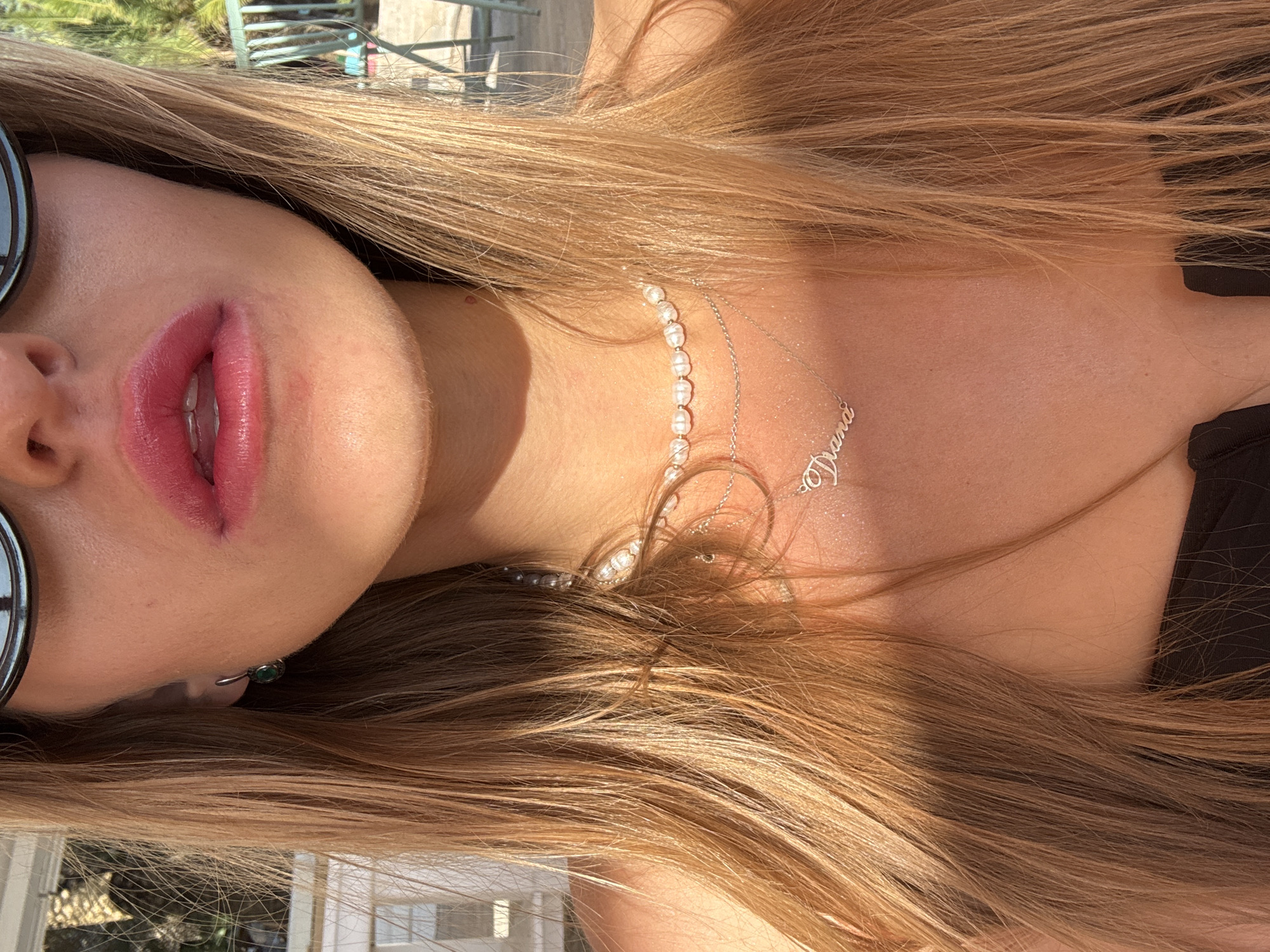 Woman takes selfies at Montenegro beach resort