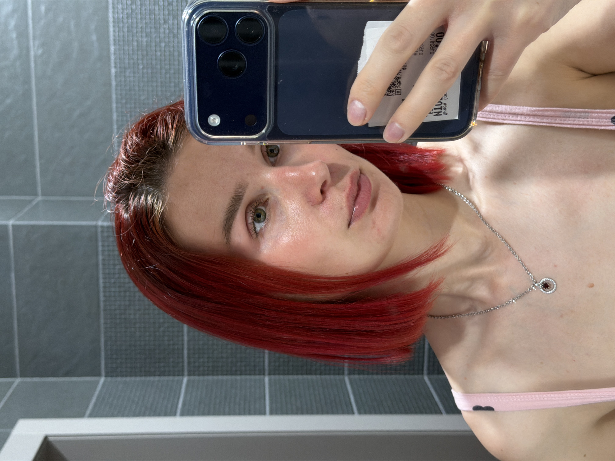 Person takes bathroom selfie in Chaikovsky, Russia