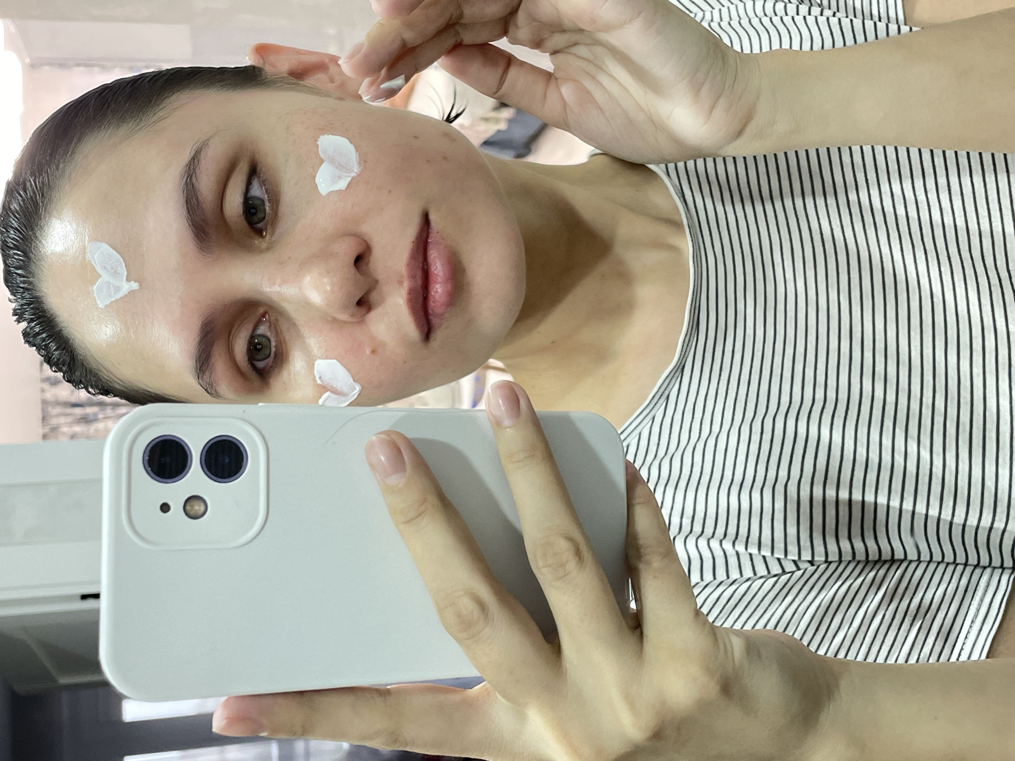 Late-night skincare routine captured in Izhevsk selfies
