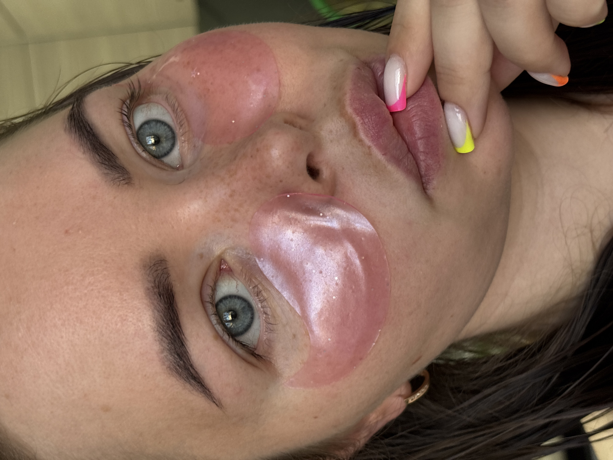 Woman's skincare routine captured in nighttime portrait in Izhevsk