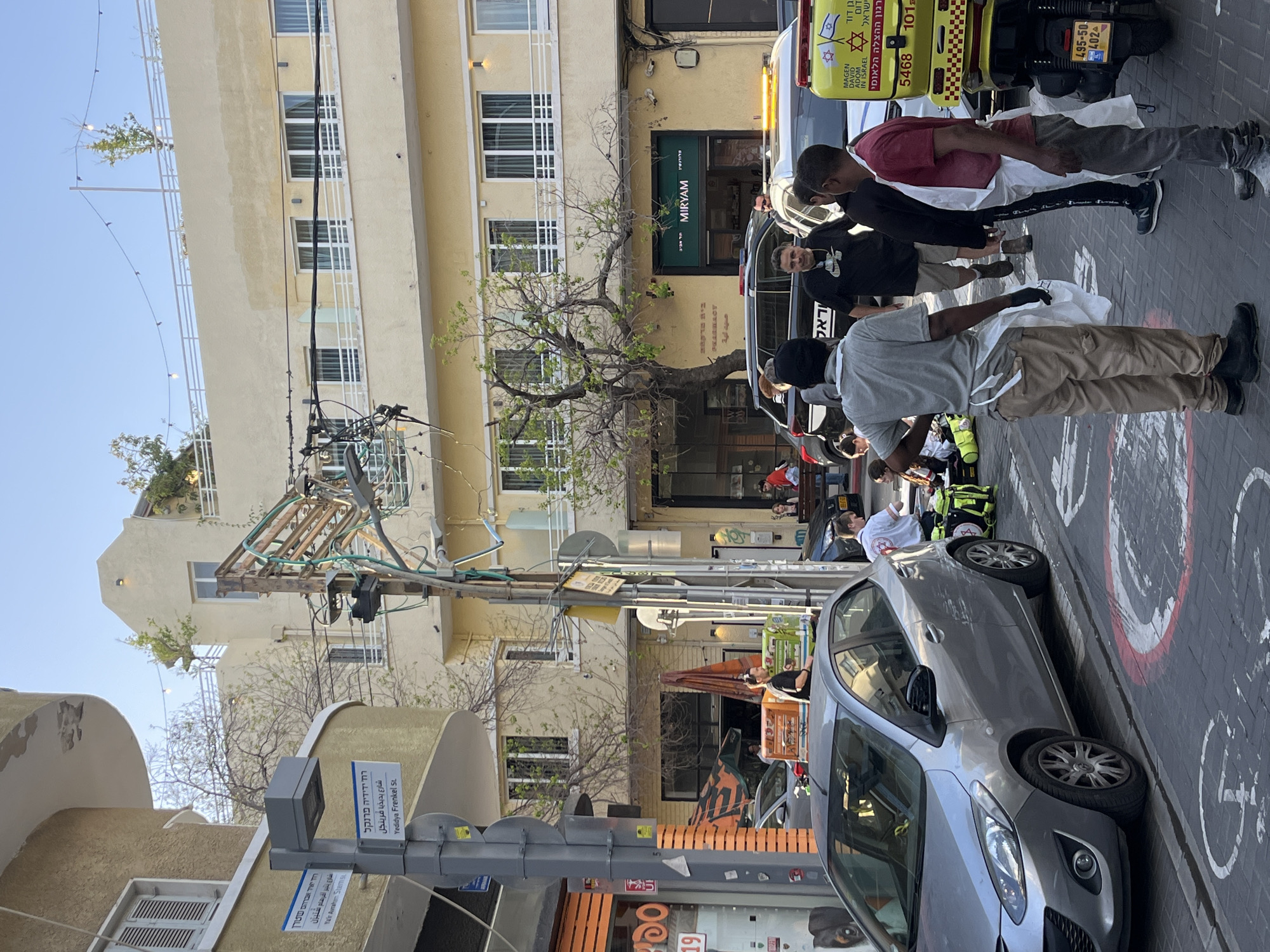 Emergency response documented in Tel Aviv street scene