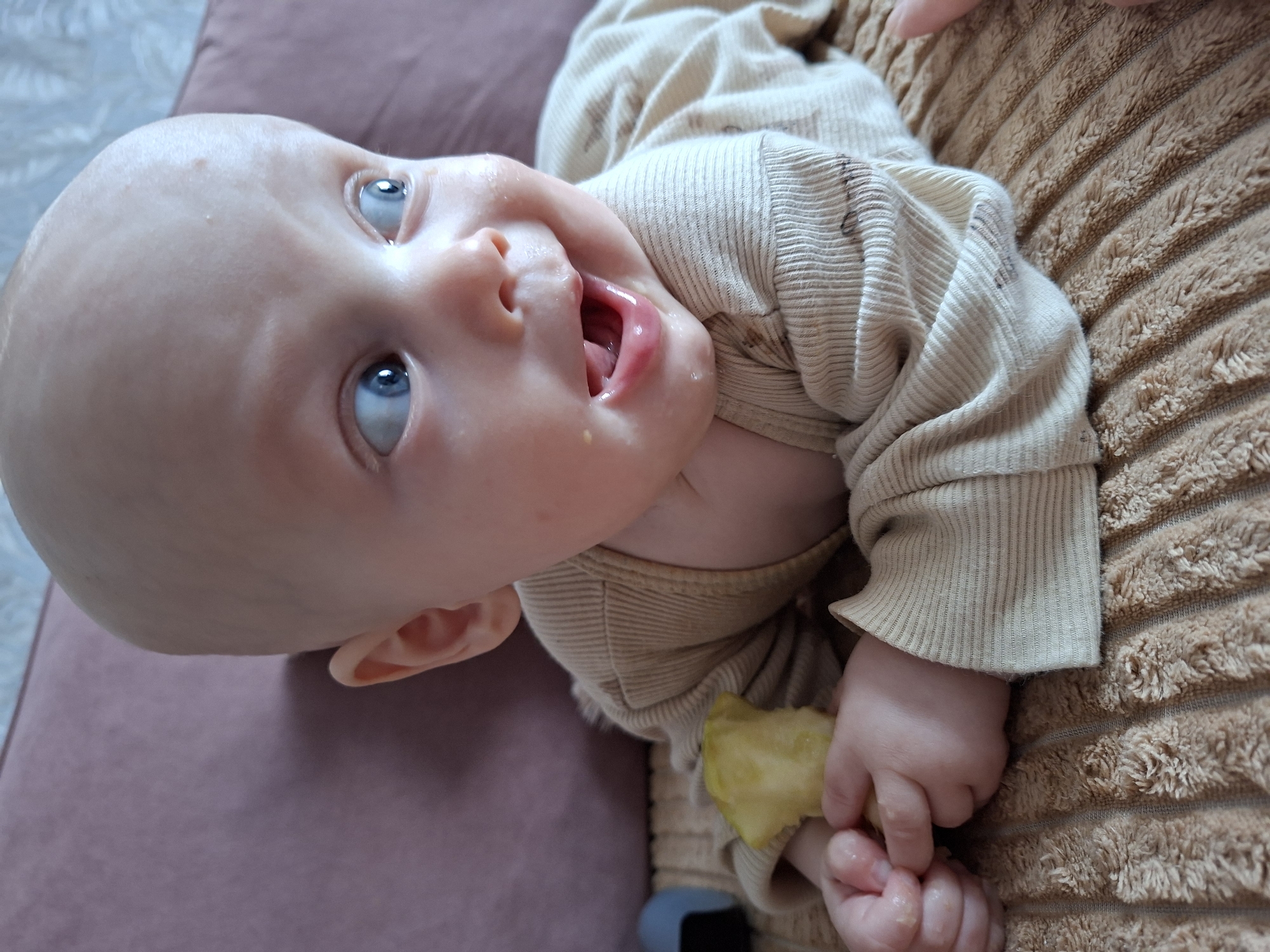 Baby photographed indoors in Karsha, Russia