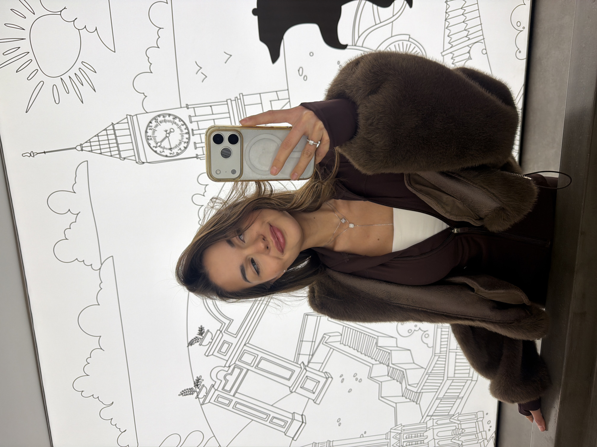 Woman takes selfies at London mural in Krasnoyarsk
