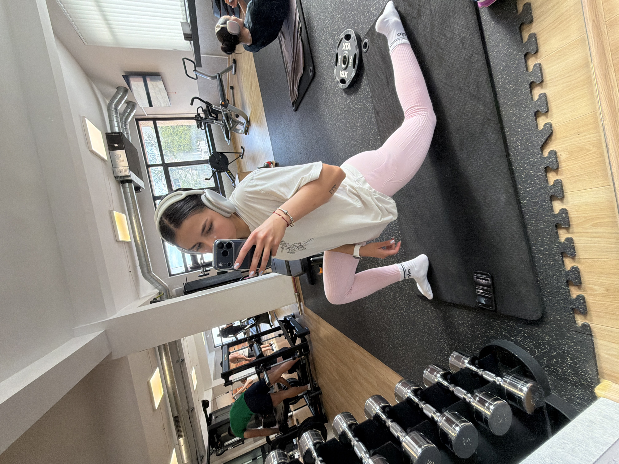 Woman documents gym session and healthy meal in Gabrovo