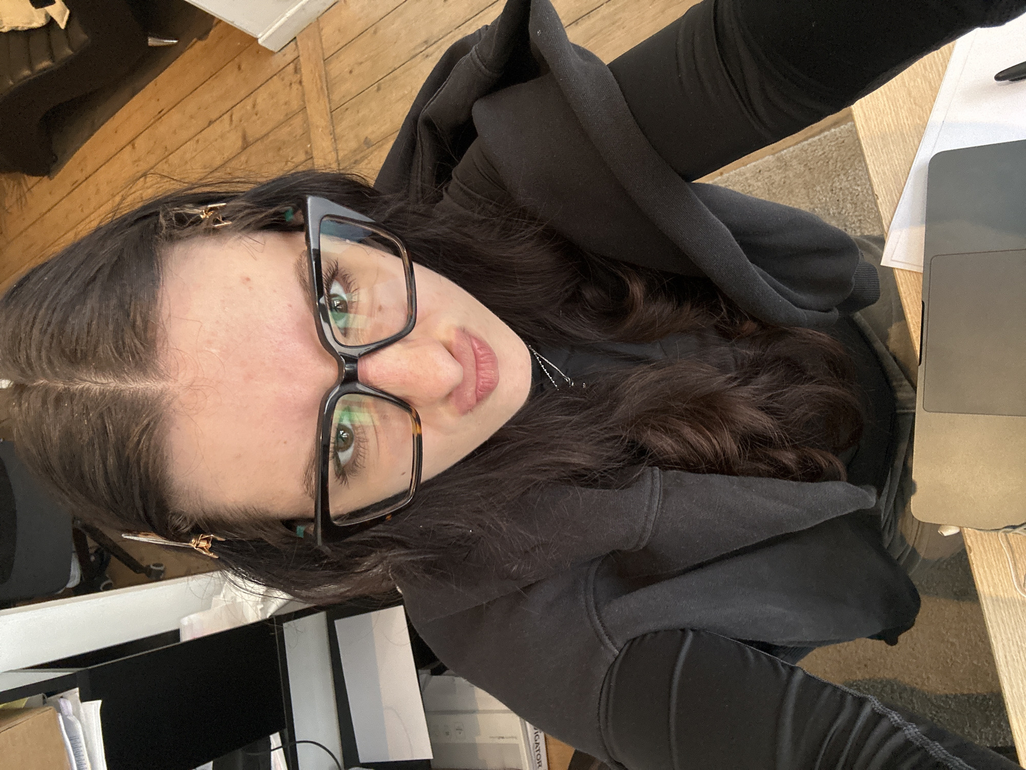 Two women take morning selfies in Antwerp apartments