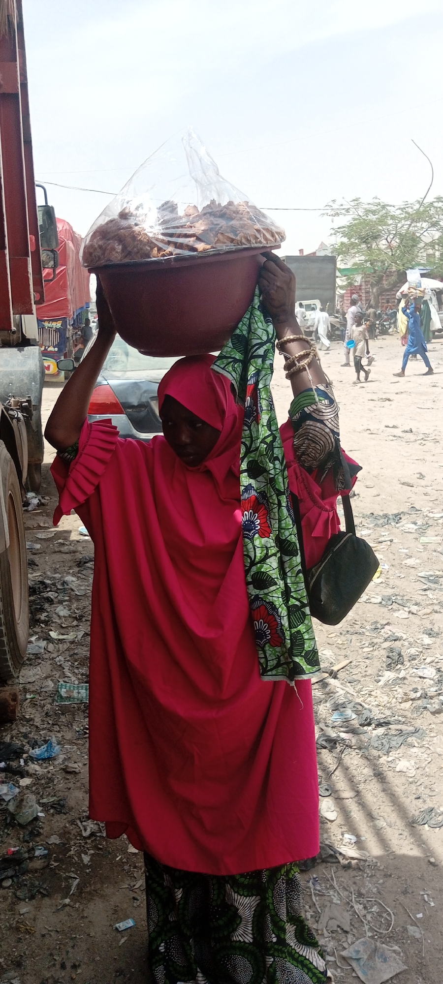 Daily life unfolds in Nigeria's Fagge district marketplace