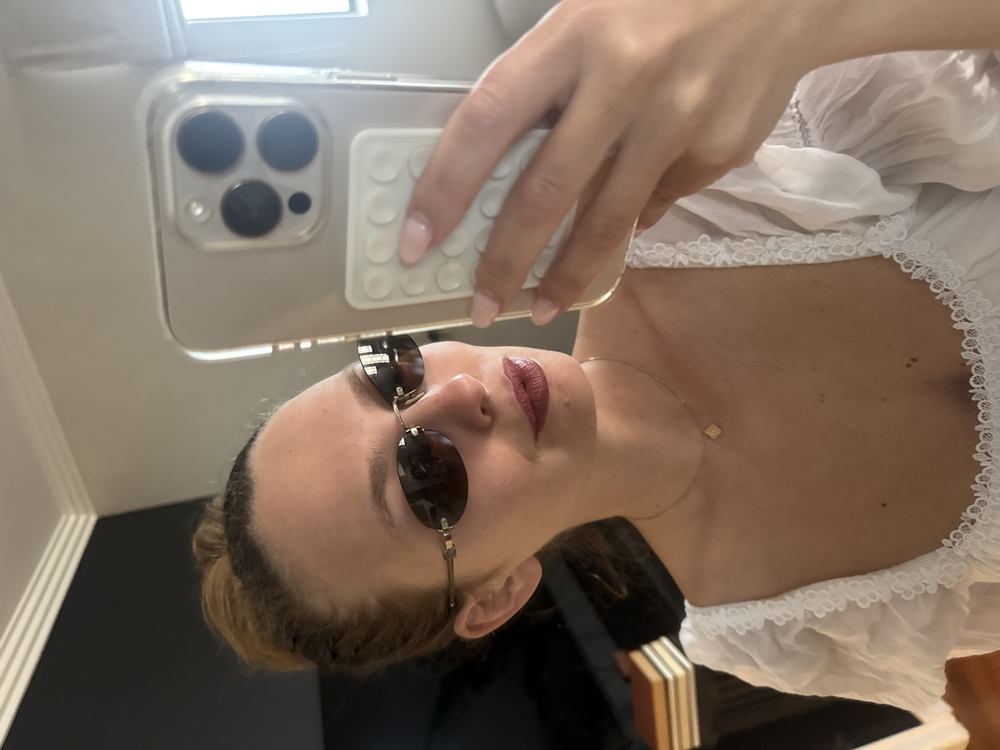Woman takes indoor selfies in Cape Town apartment