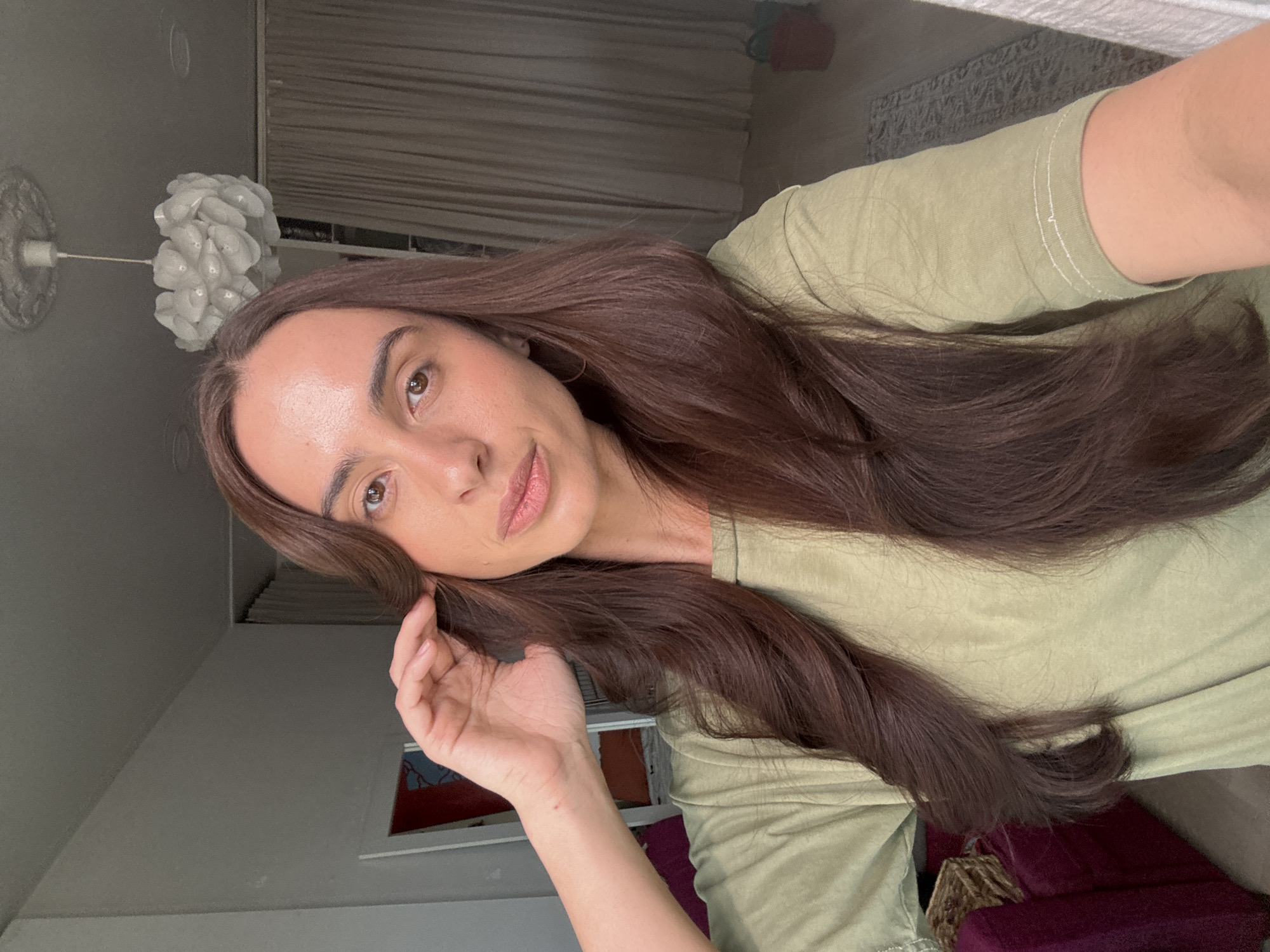 Woman Takes Indoor Selfie in Krasnoyarsk Home