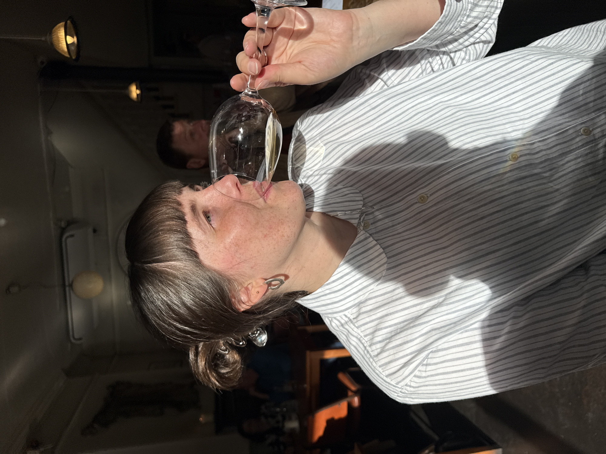 London resident enjoys drink during afternoon social gathering