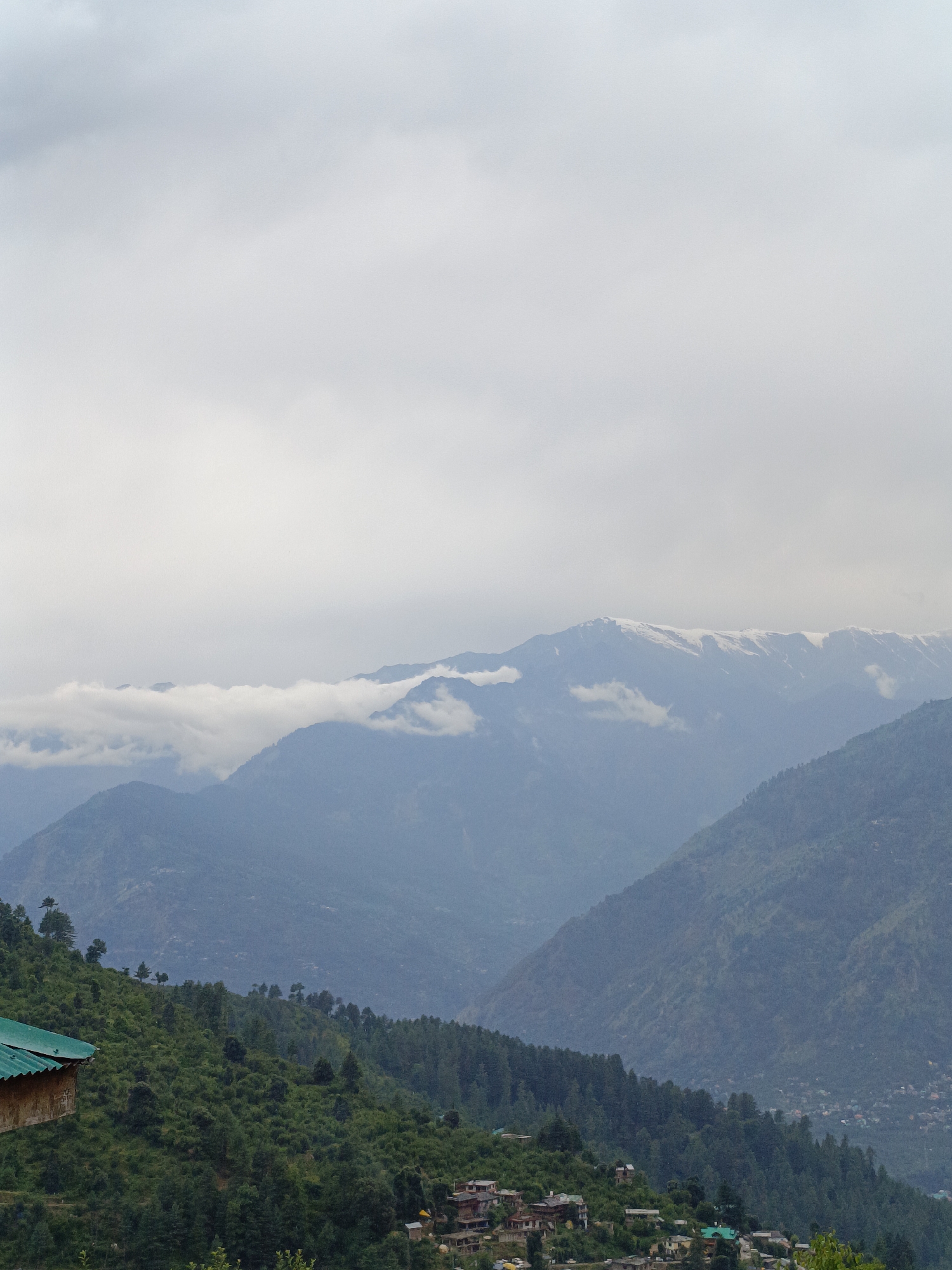 Misty morning views across a remote Himalayan village