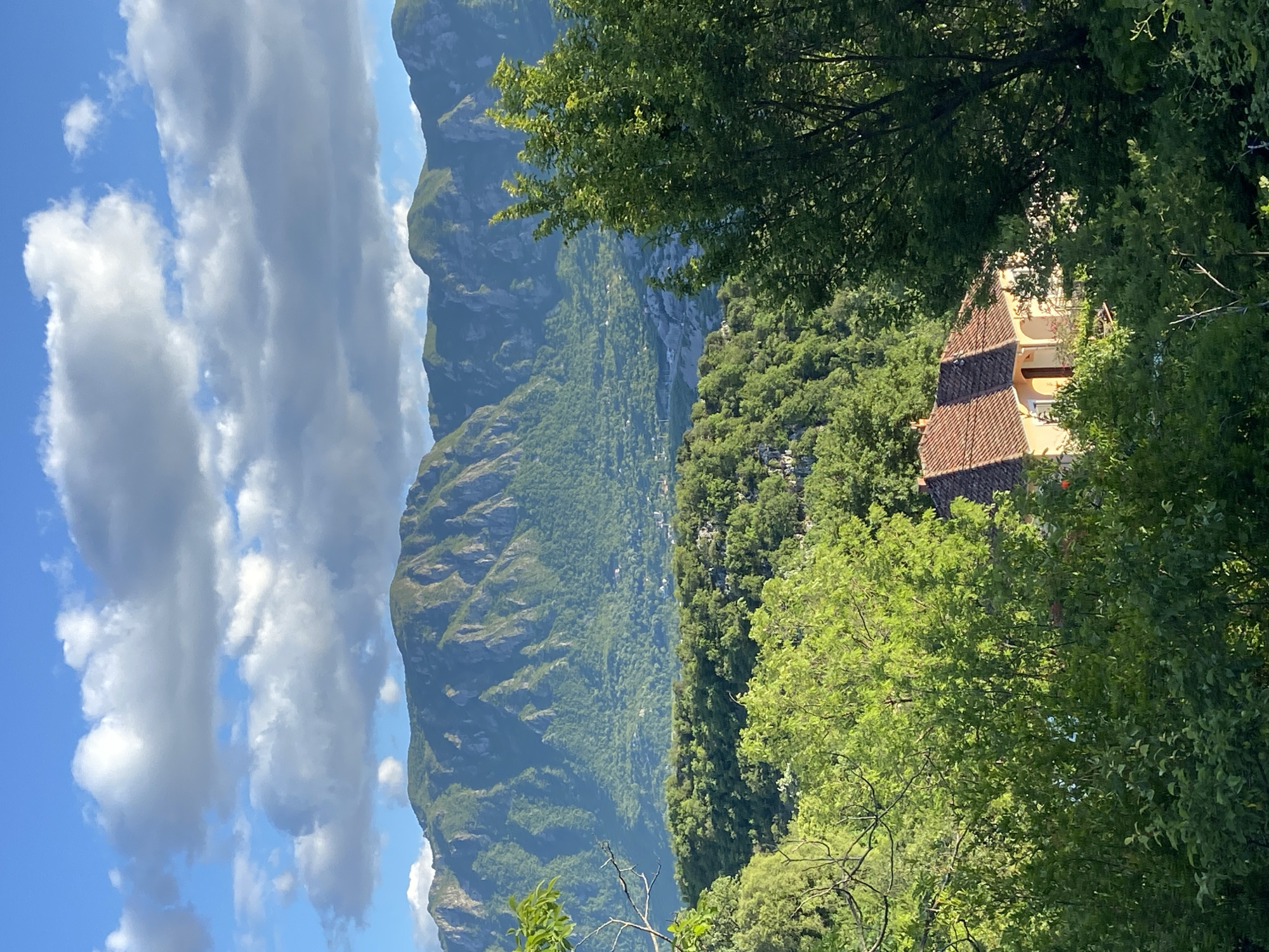 Rural Montenegro scenes documented: mountain valleys and graffitied bus shelter