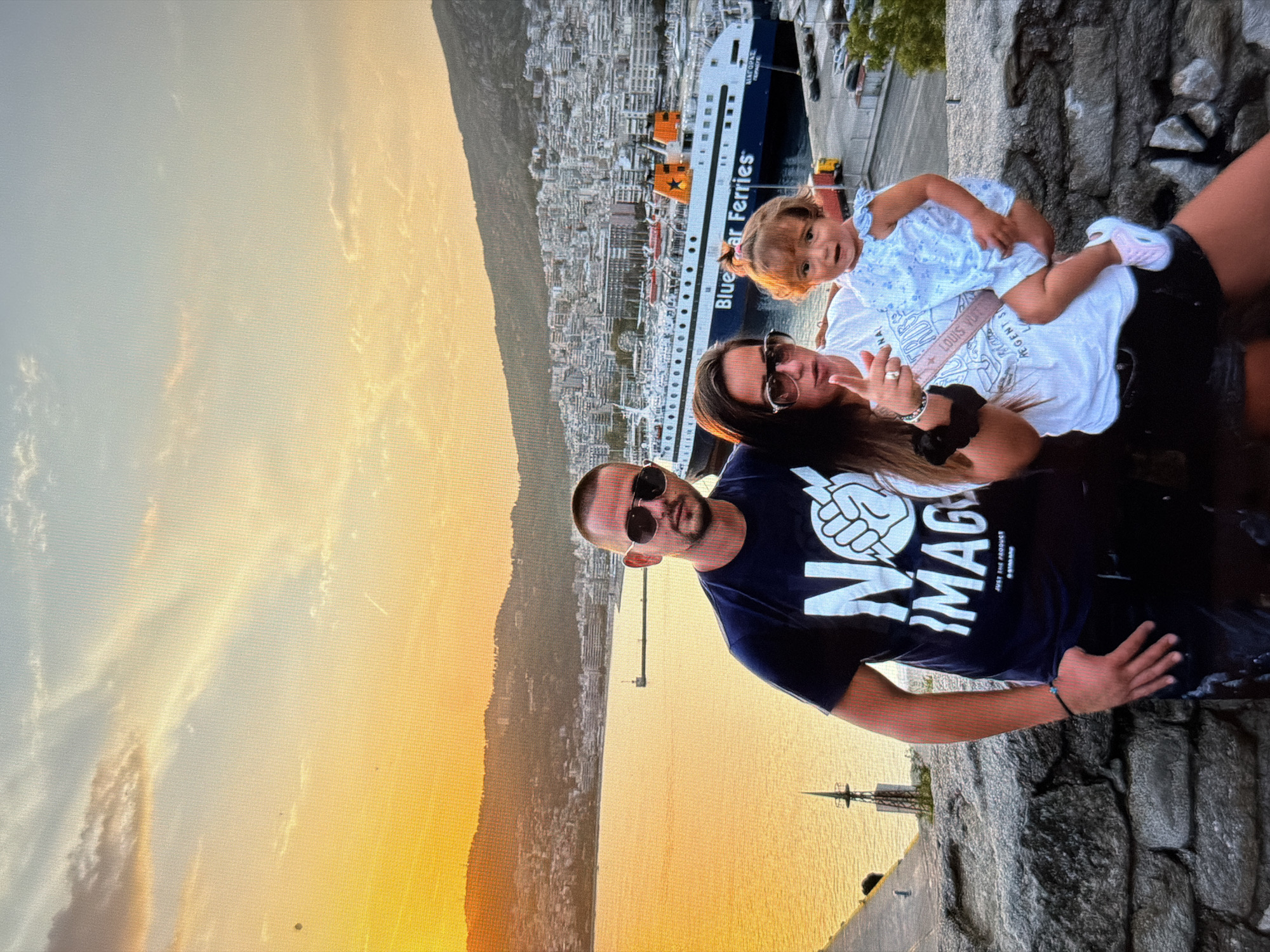 Family captures sunset photos overlooking Burgas port city