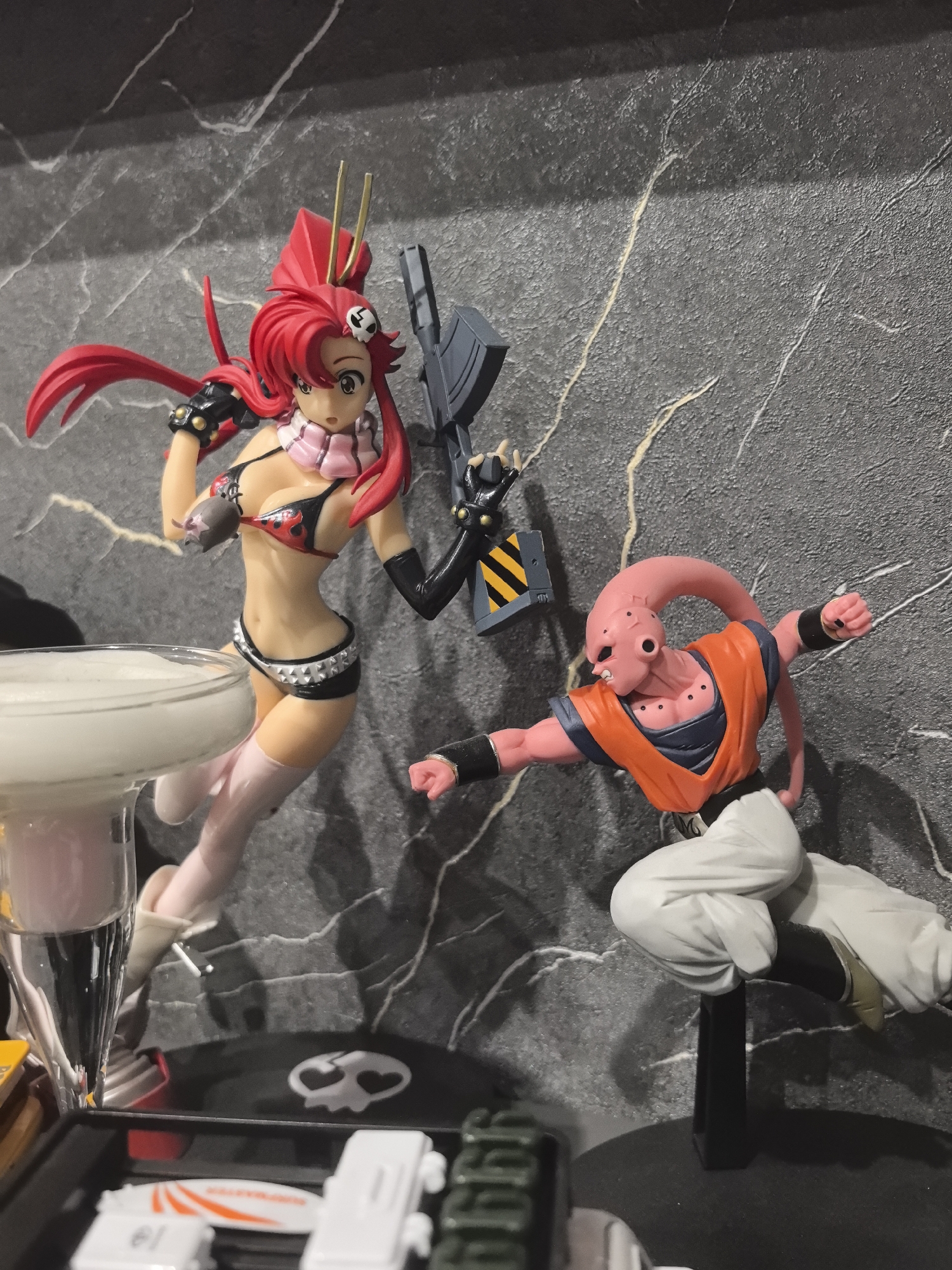 Anime figures and die-cast cars displayed in Amursk
