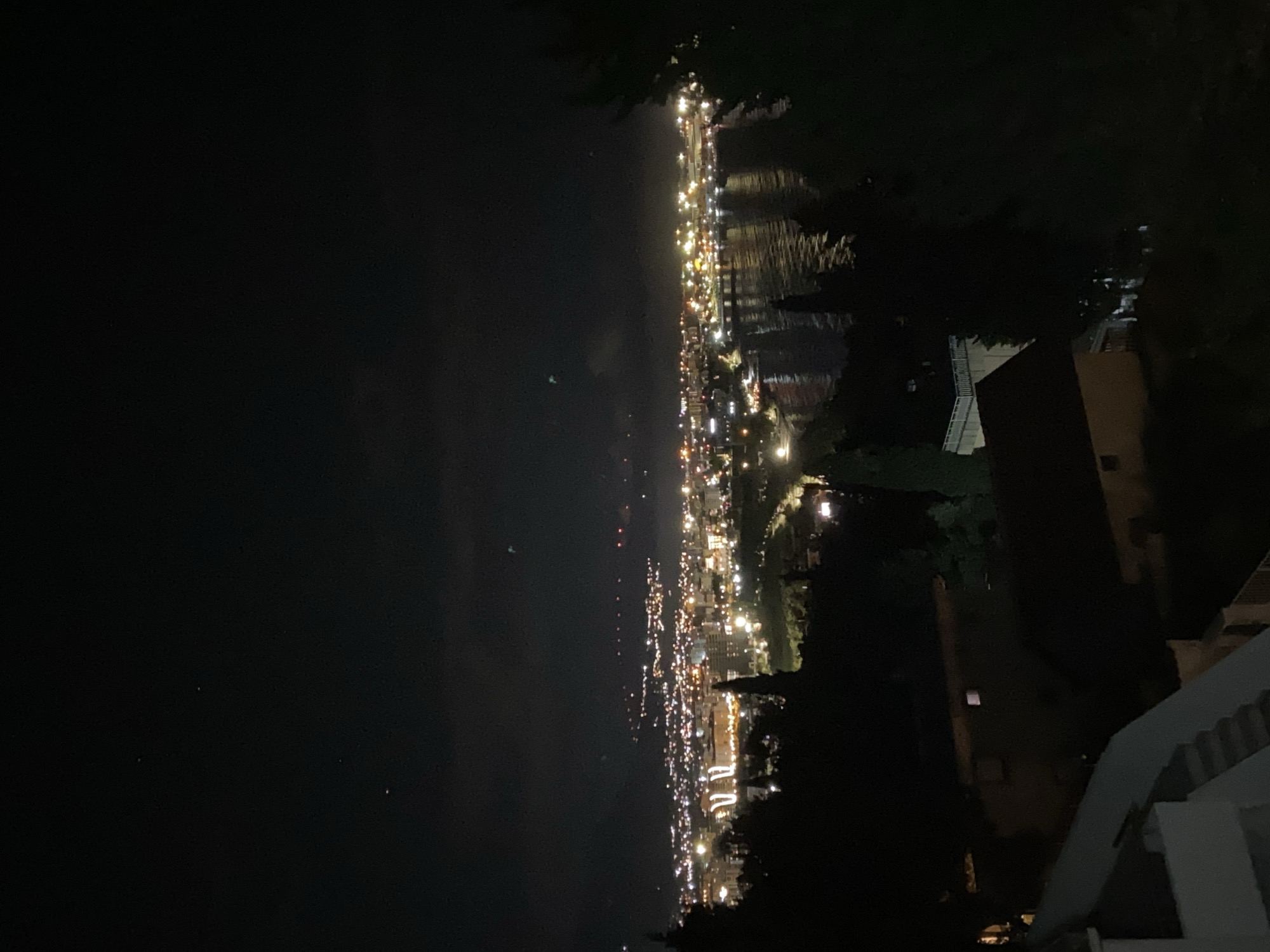 Nighttime coastal lights captured in Šušanj, Montenegro