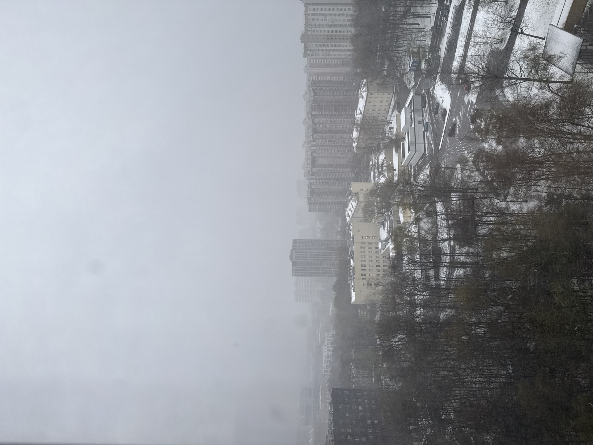 Snowy overcast day observed in Khimki residential district