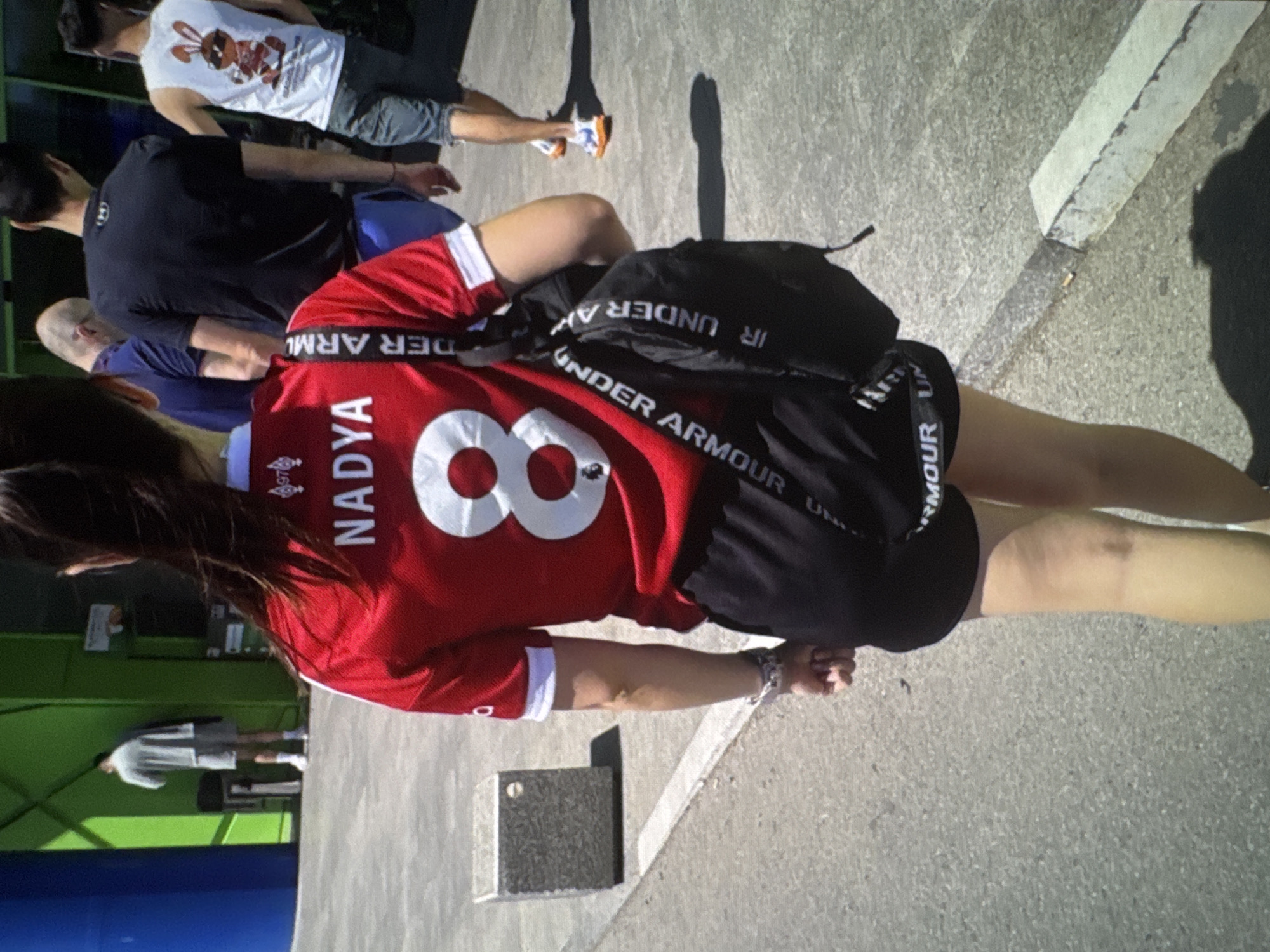 Soccer match viewing with beer and team jerseys