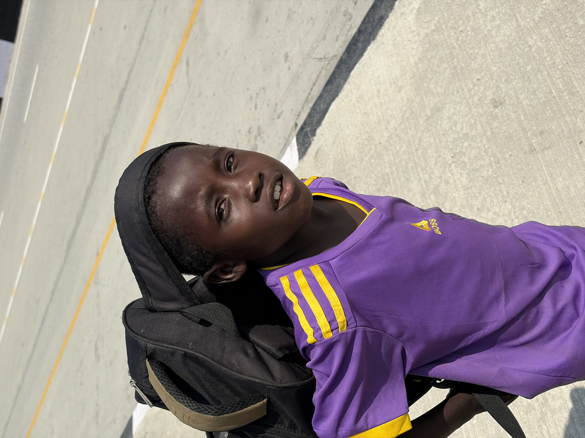 Nigerian street scenes show daily transport, commerce activity