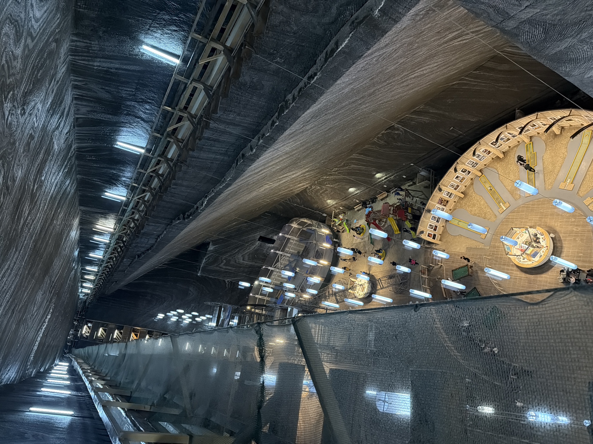 Tourist explores Salina Turda salt mine attraction in Romania