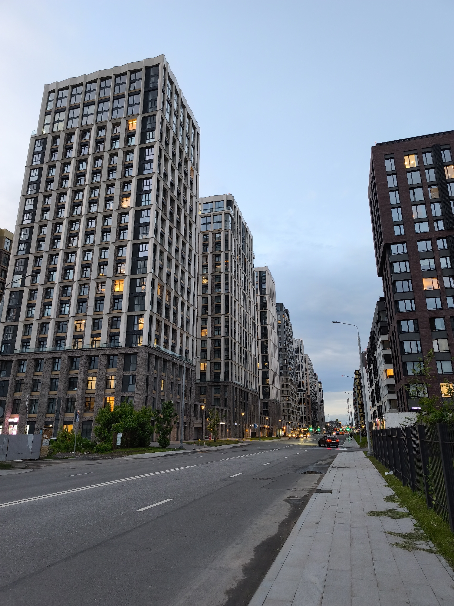Purple tracksuit wearer documents Moscow streets in evening walkabout
