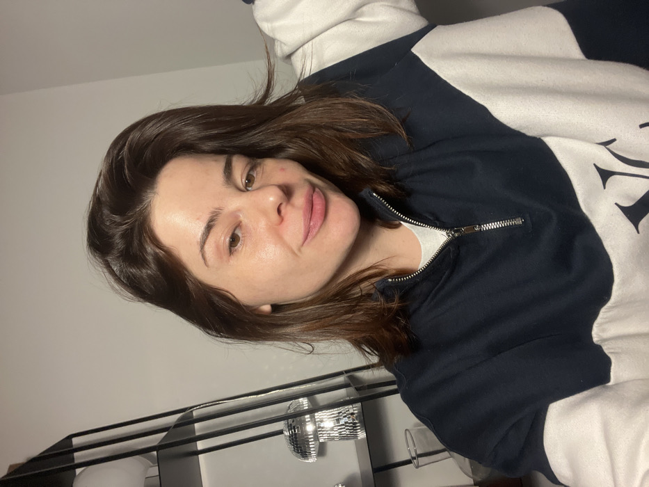 Woman documents casual evening with selfies in Roubaix apartment